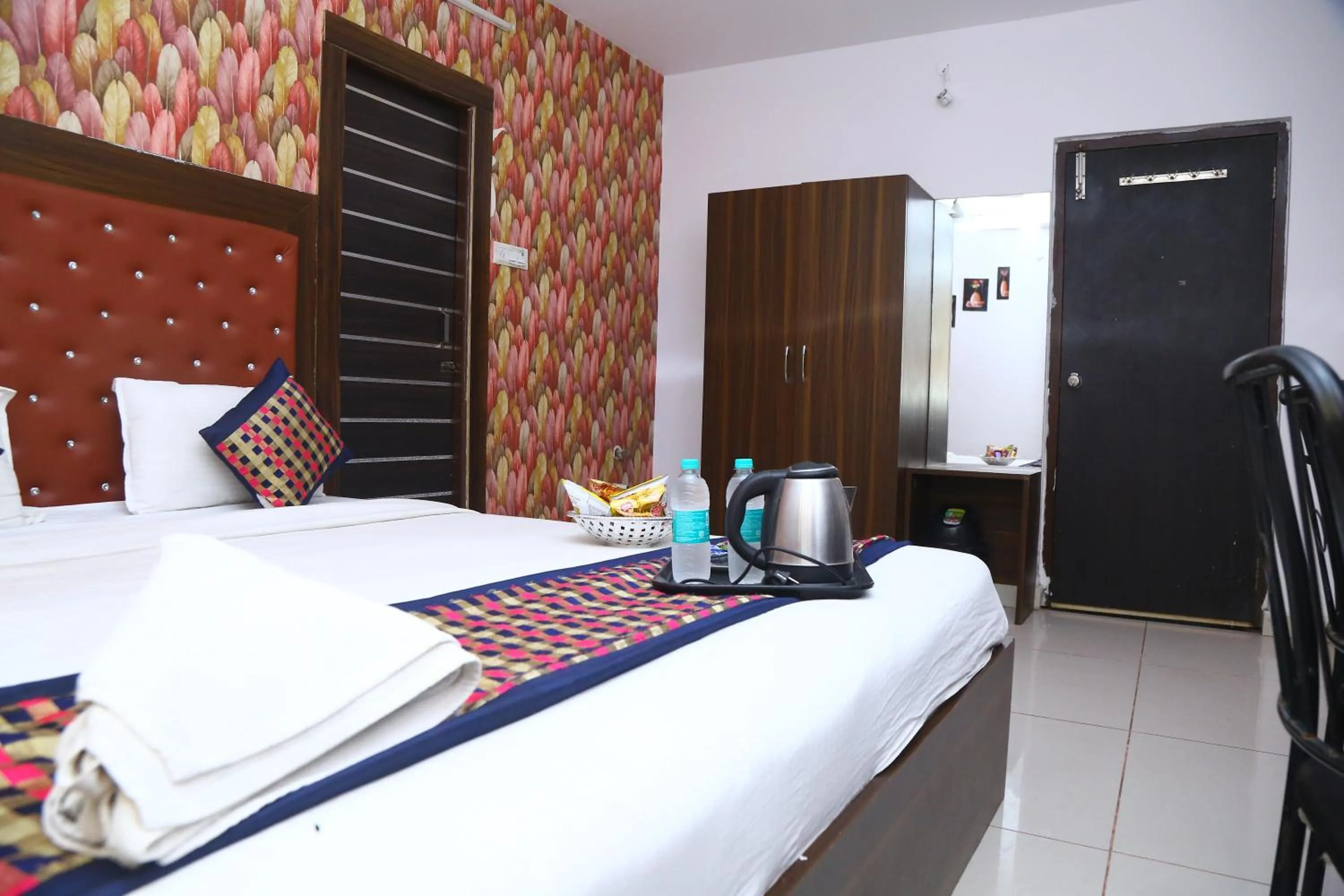 Photo of the whole room, Bed in Hotel MN Grand Shamshabad Airport Zone Hyderabad