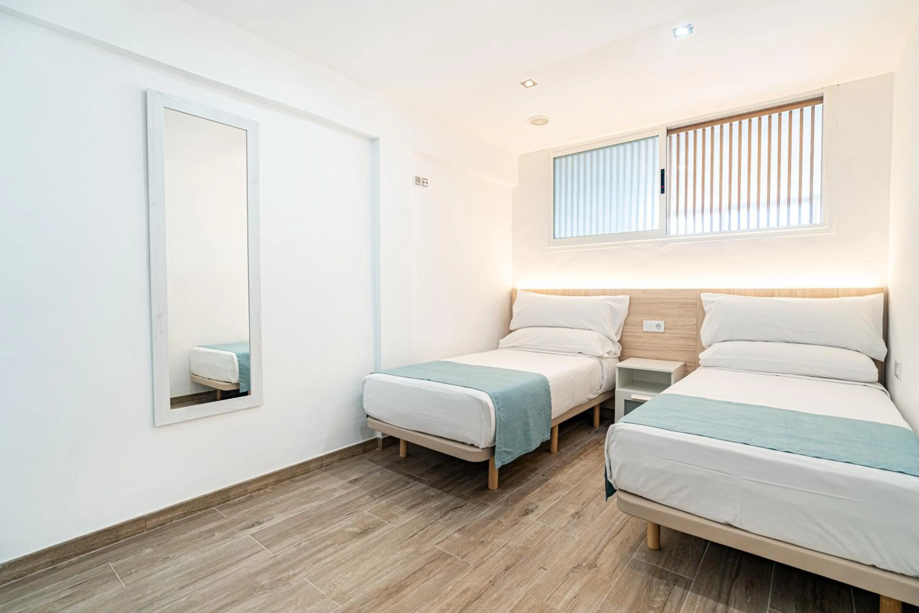 Bed in New Kensington Apartments - Econotels