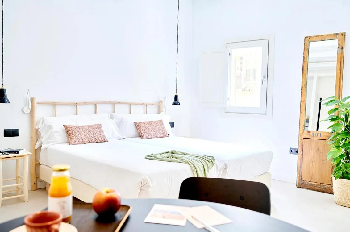 Seating area, Bed in Eco Boutique Hostal Grau