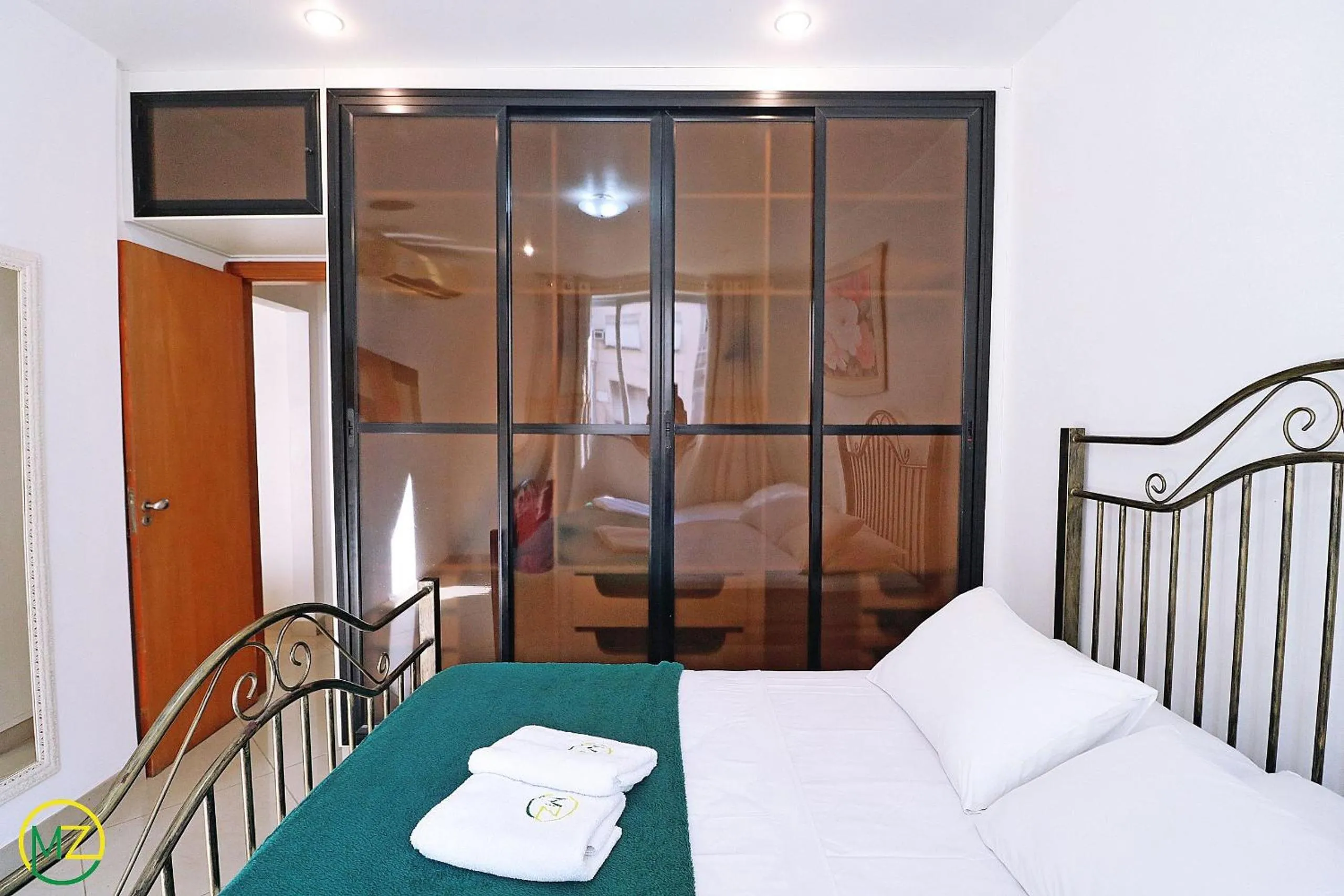 Bed in Amplo 2 quartos na praia do Leme para 7 pessoas
