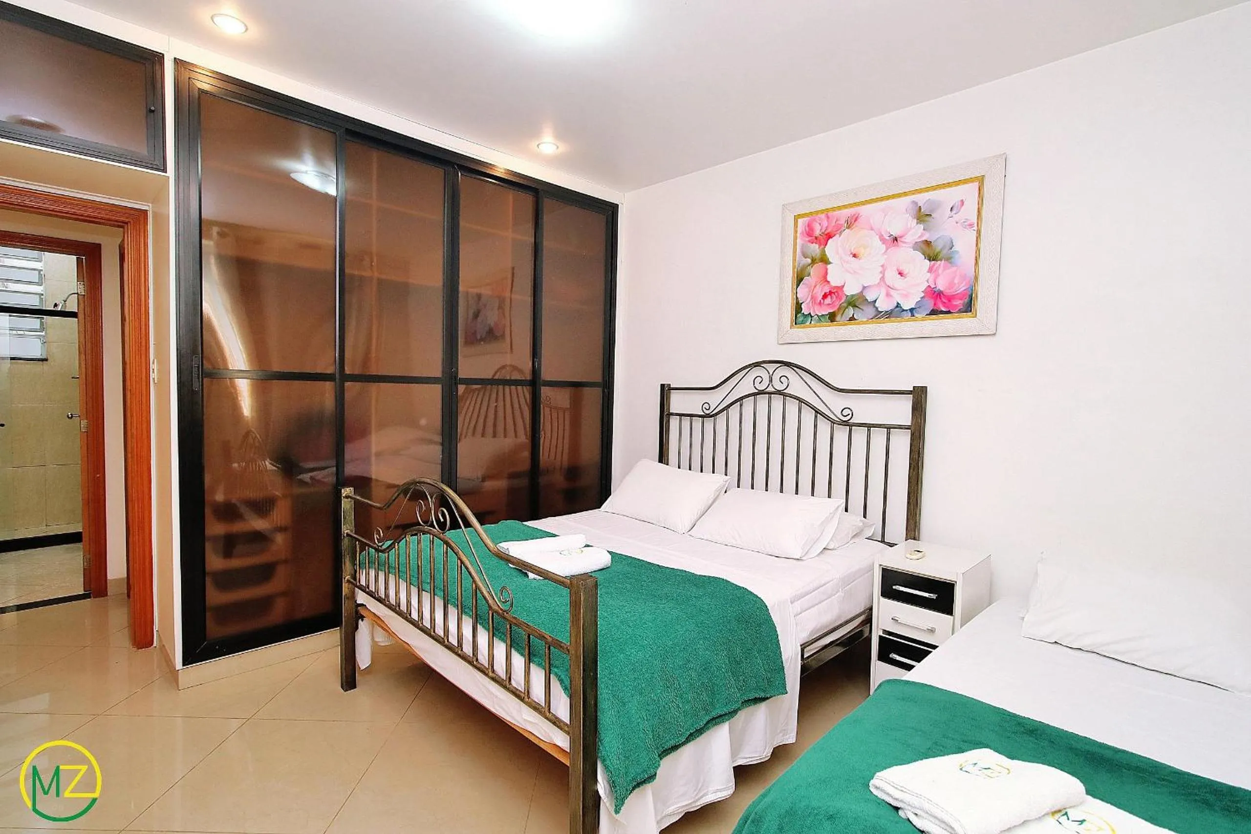 Bed in Amplo 2 quartos na praia do Leme para 7 pessoas