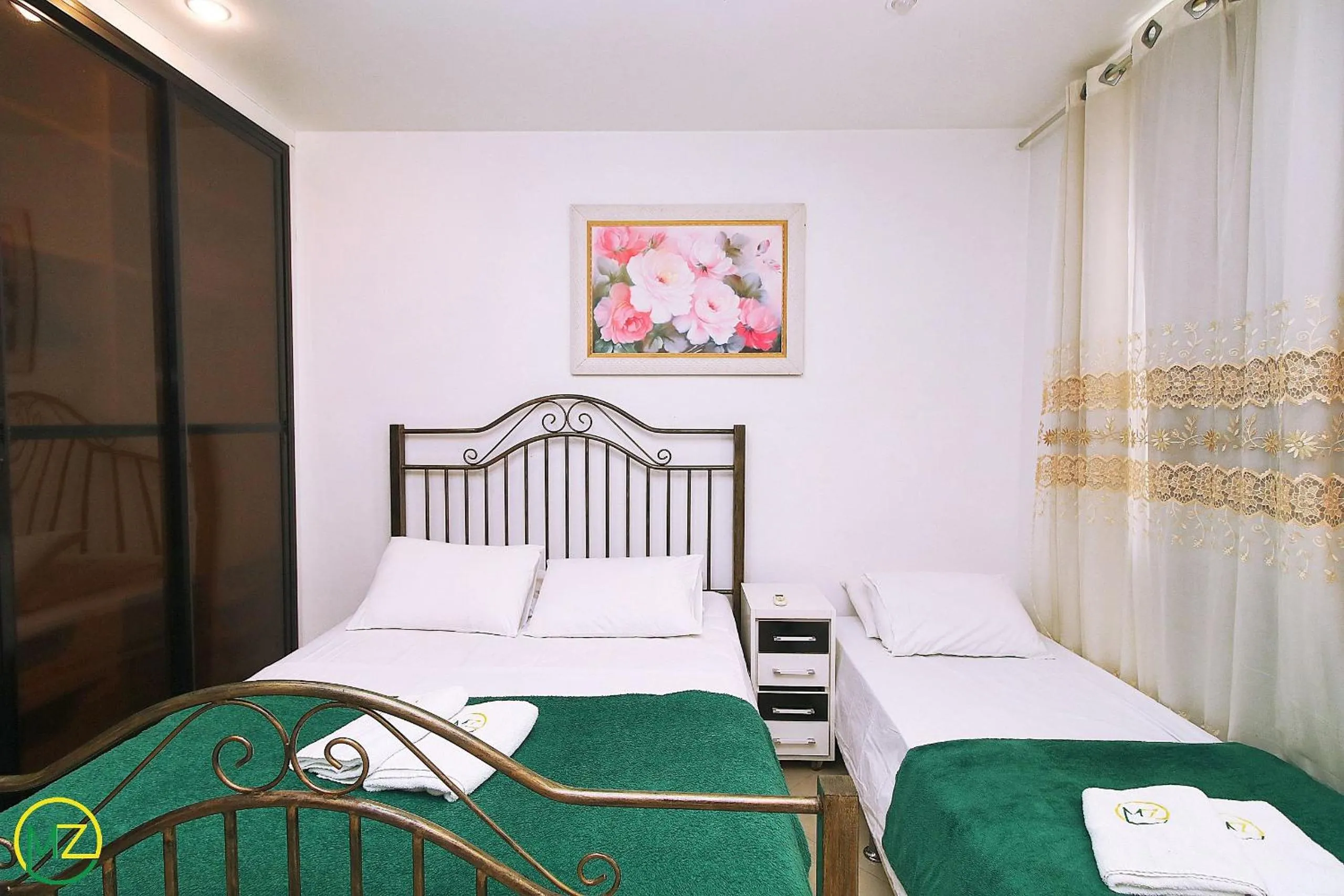 Bed in Amplo 2 quartos na praia do Leme para 7 pessoas