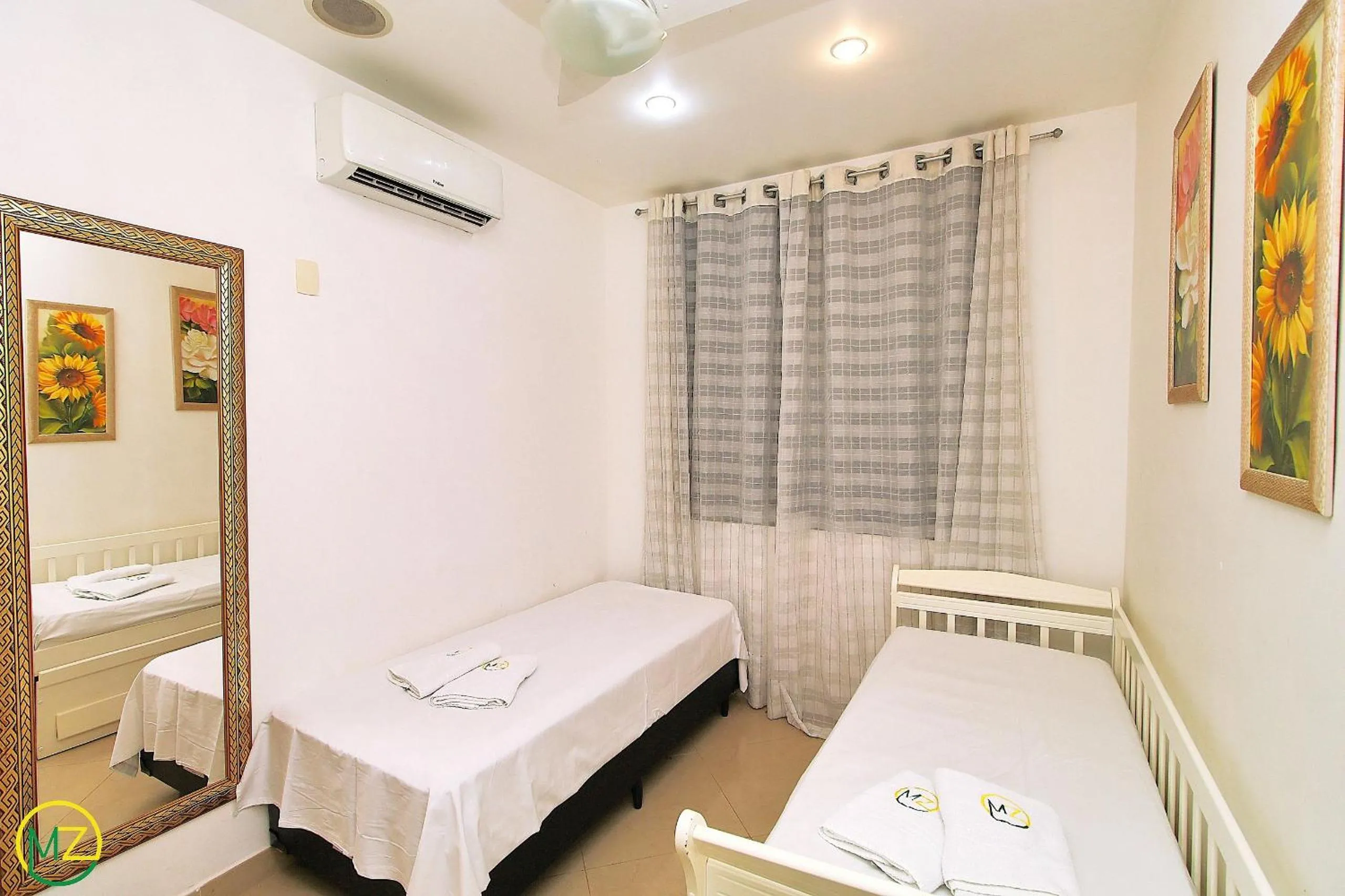 Bed in Amplo 2 quartos na praia do Leme para 7 pessoas