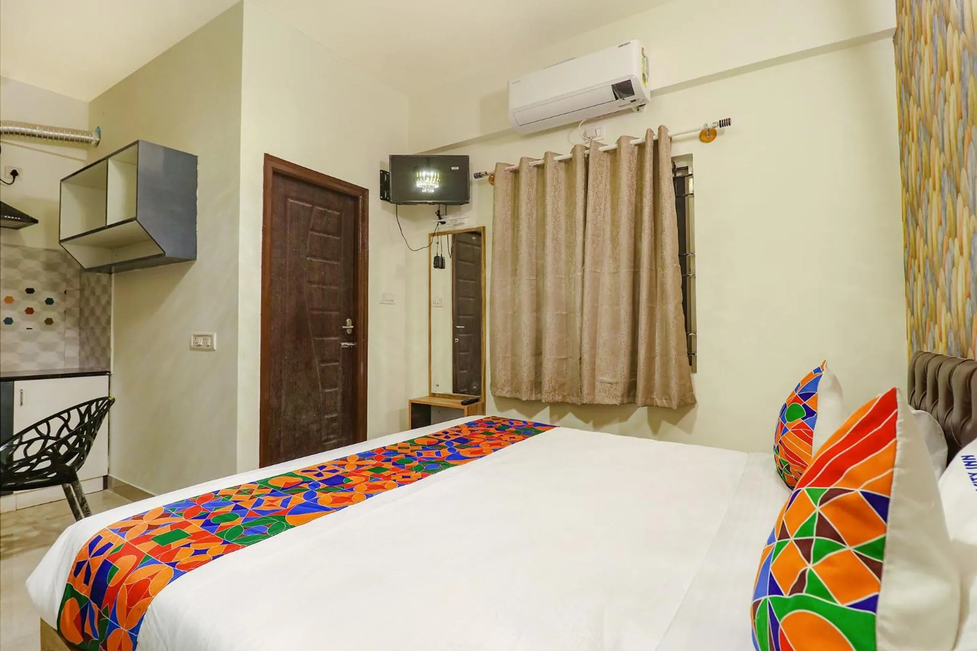 Photo of the whole room, Bed in FabHotel E City Inn - 3 Km from Infosys Campus