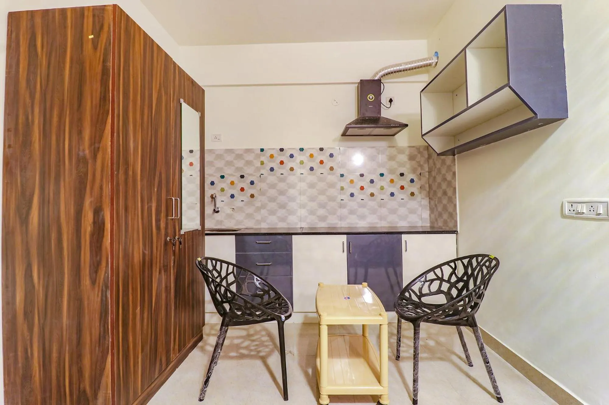 Kitchen or kitchenette in FabHotel E City Inn - 3 Km from Infosys Campus