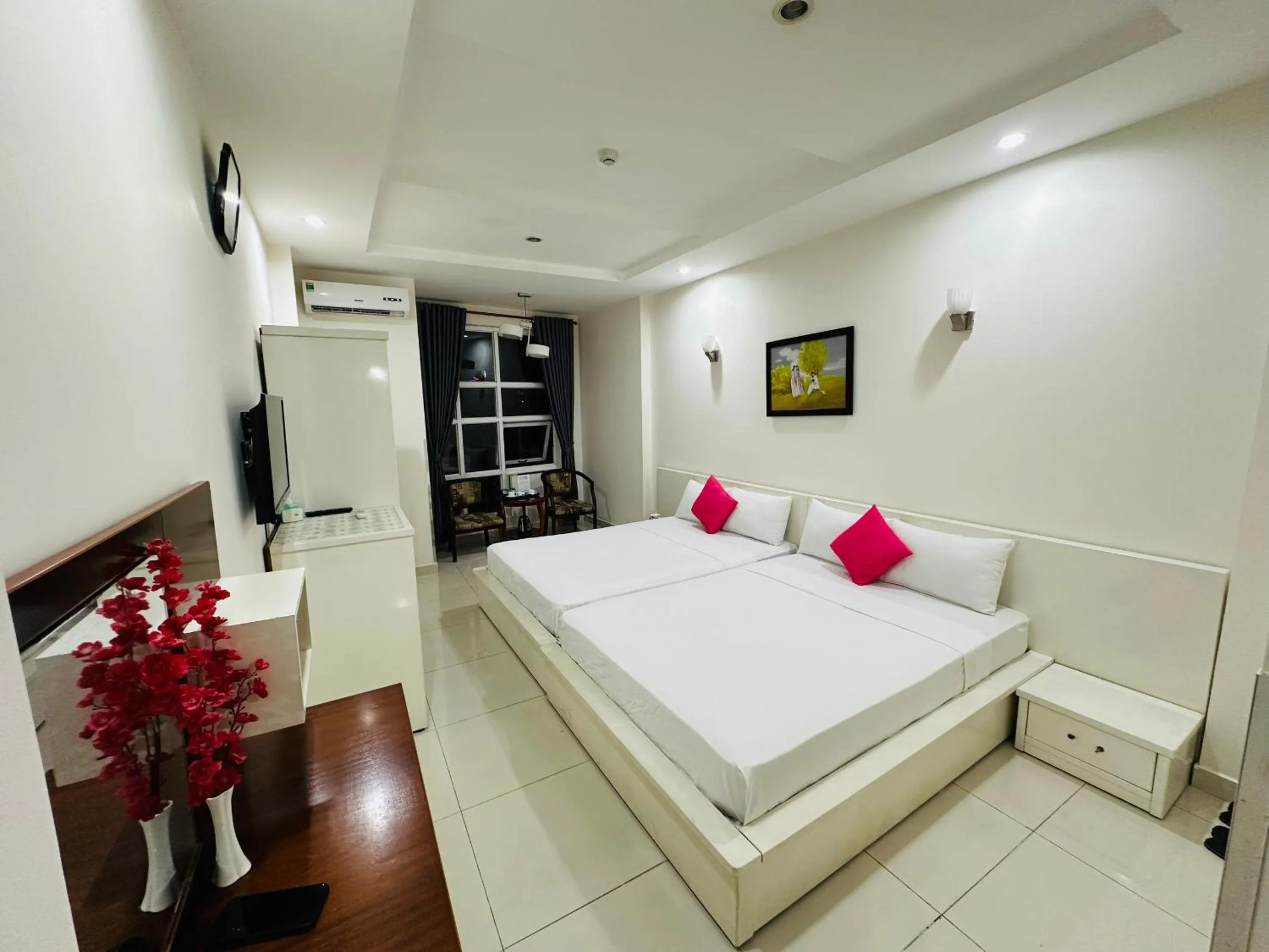 Bed in REDFLOWER HOTEL