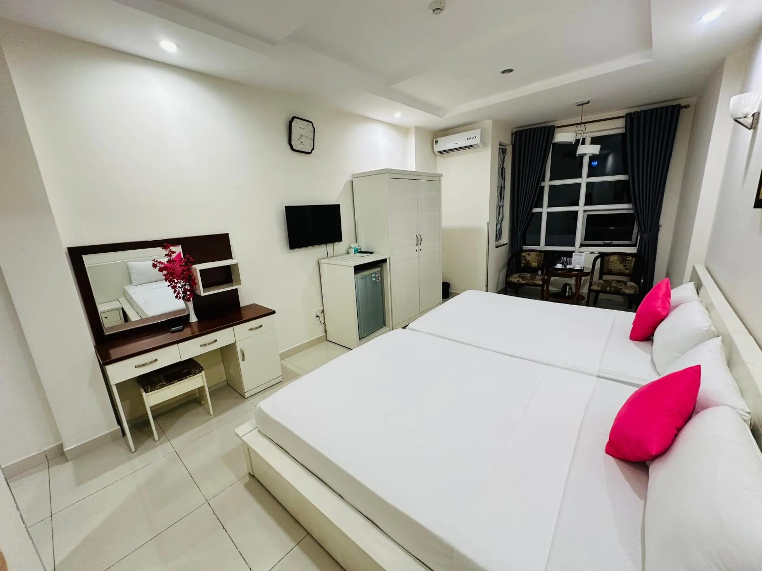 Bed in REDFLOWER HOTEL