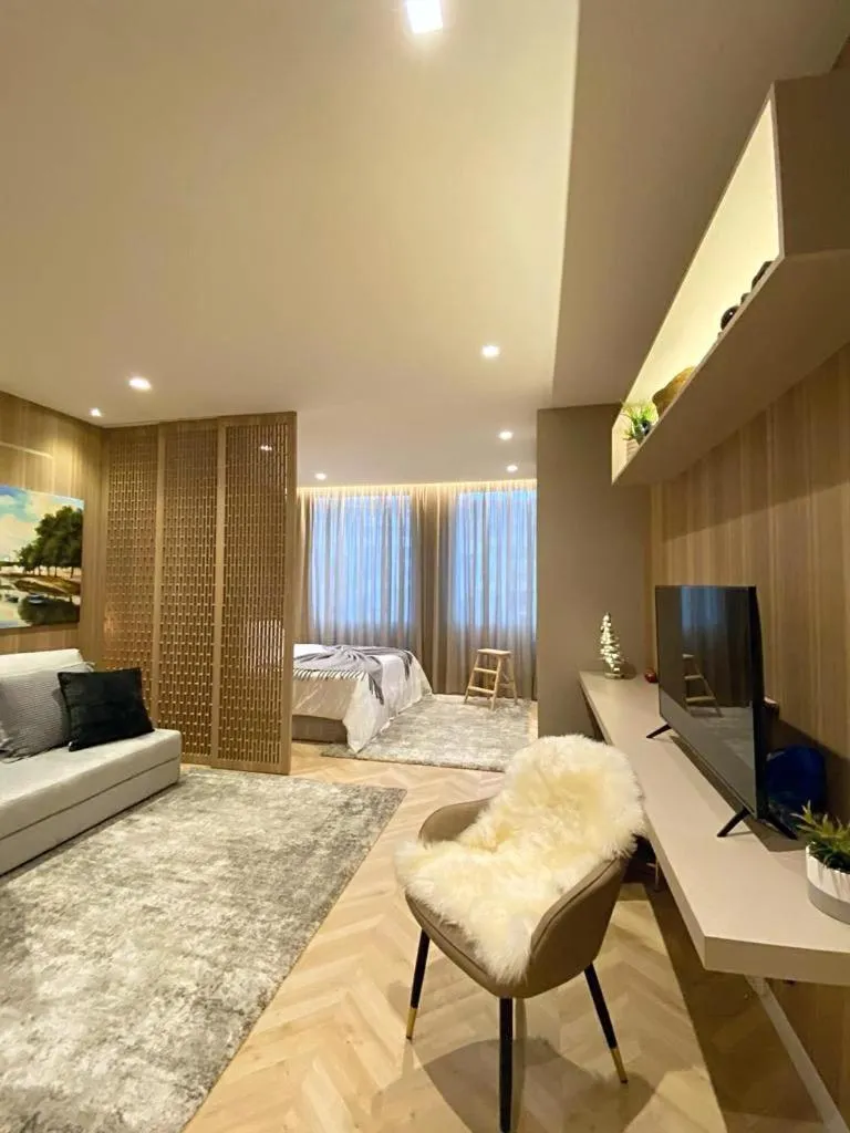Seating area, Bed in Alamedastudio
