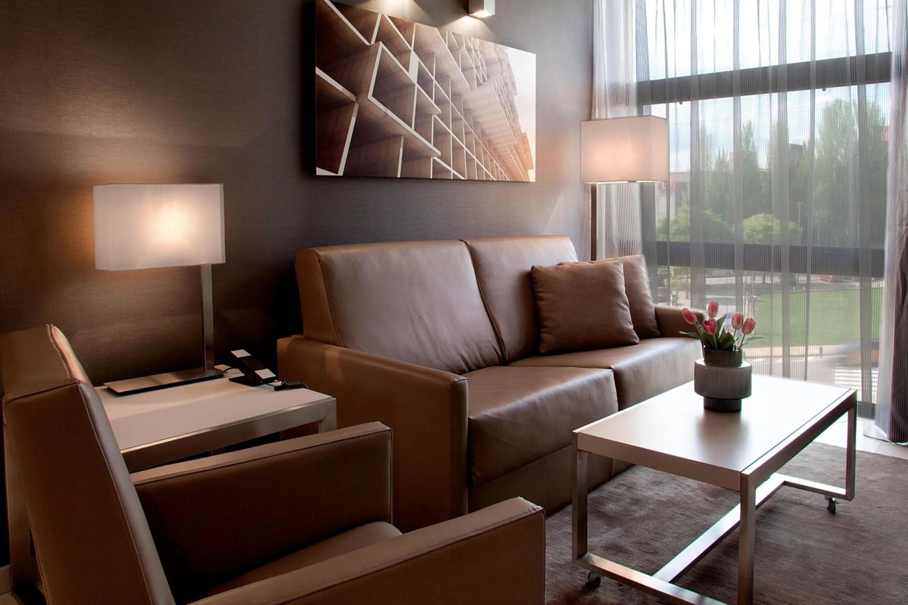 Living room in AC Hotel San Cugat by Marriott