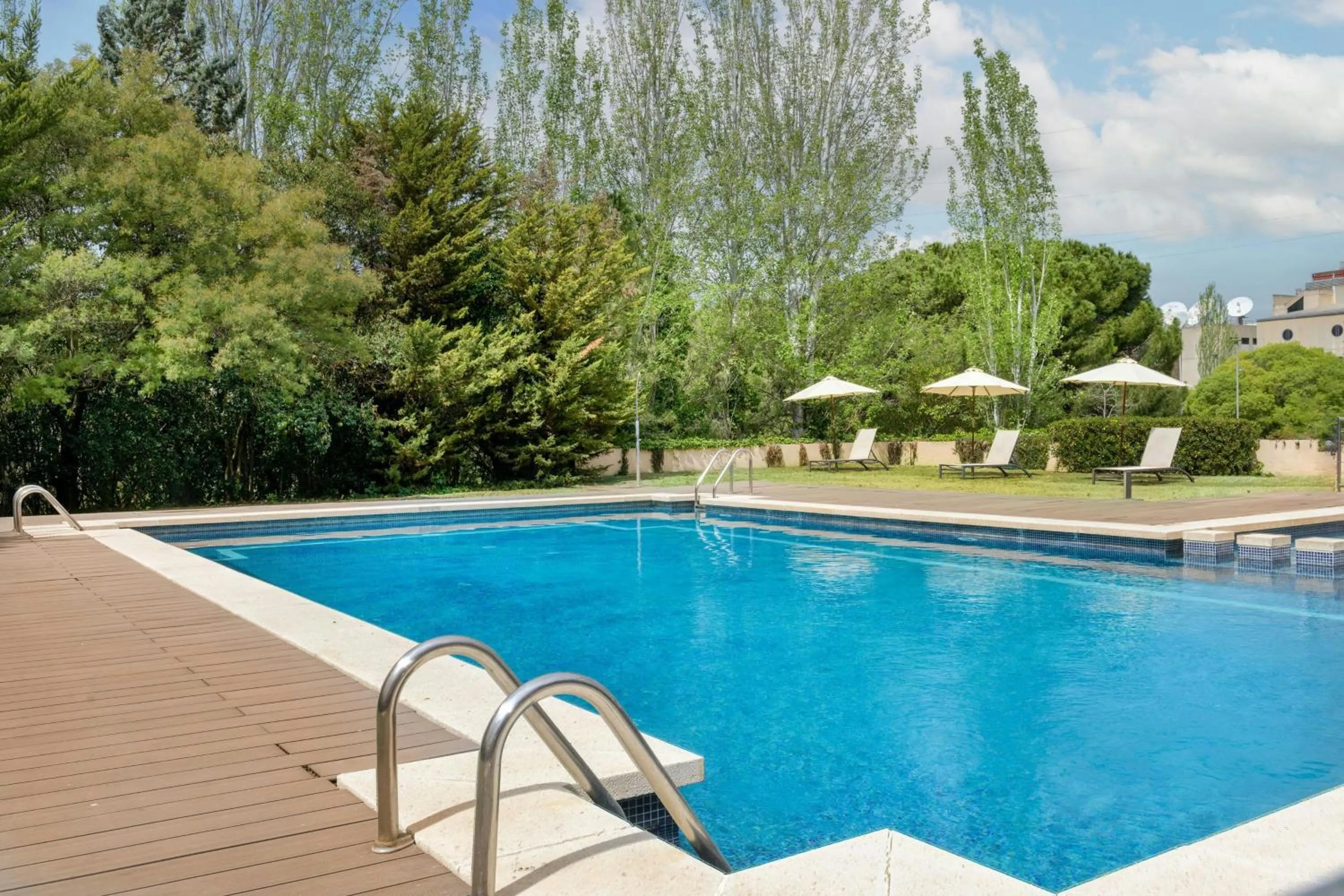 Swimming pool in AC Hotel San Cugat by Marriott