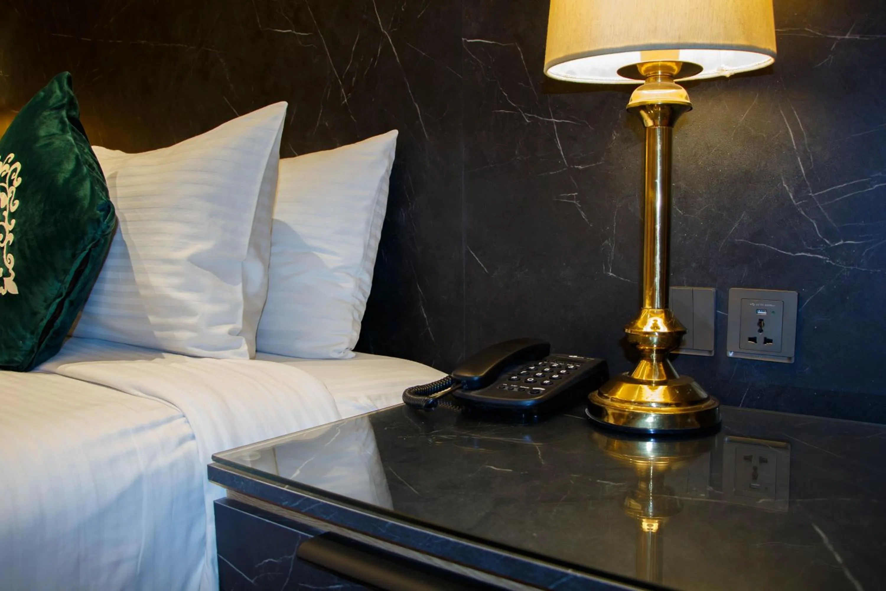 Bed in Hotel Hillview Islamabad