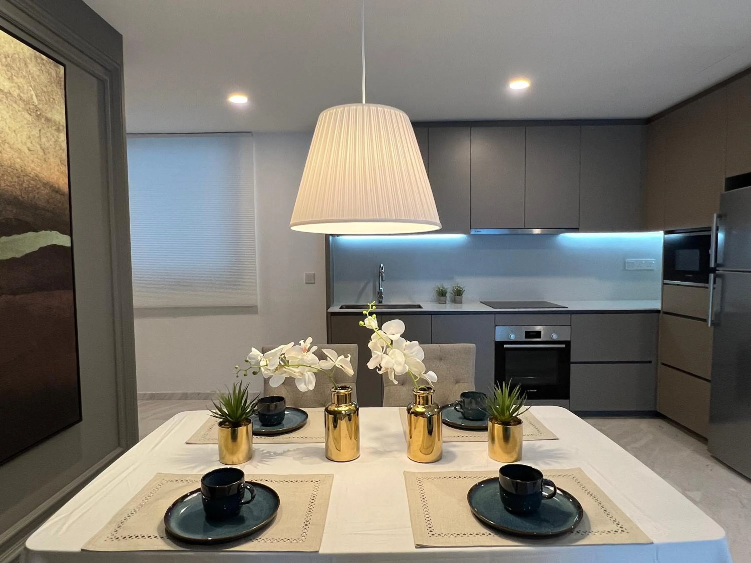 Kitchen or kitchenette in Eaton Residences KLCC by WSD