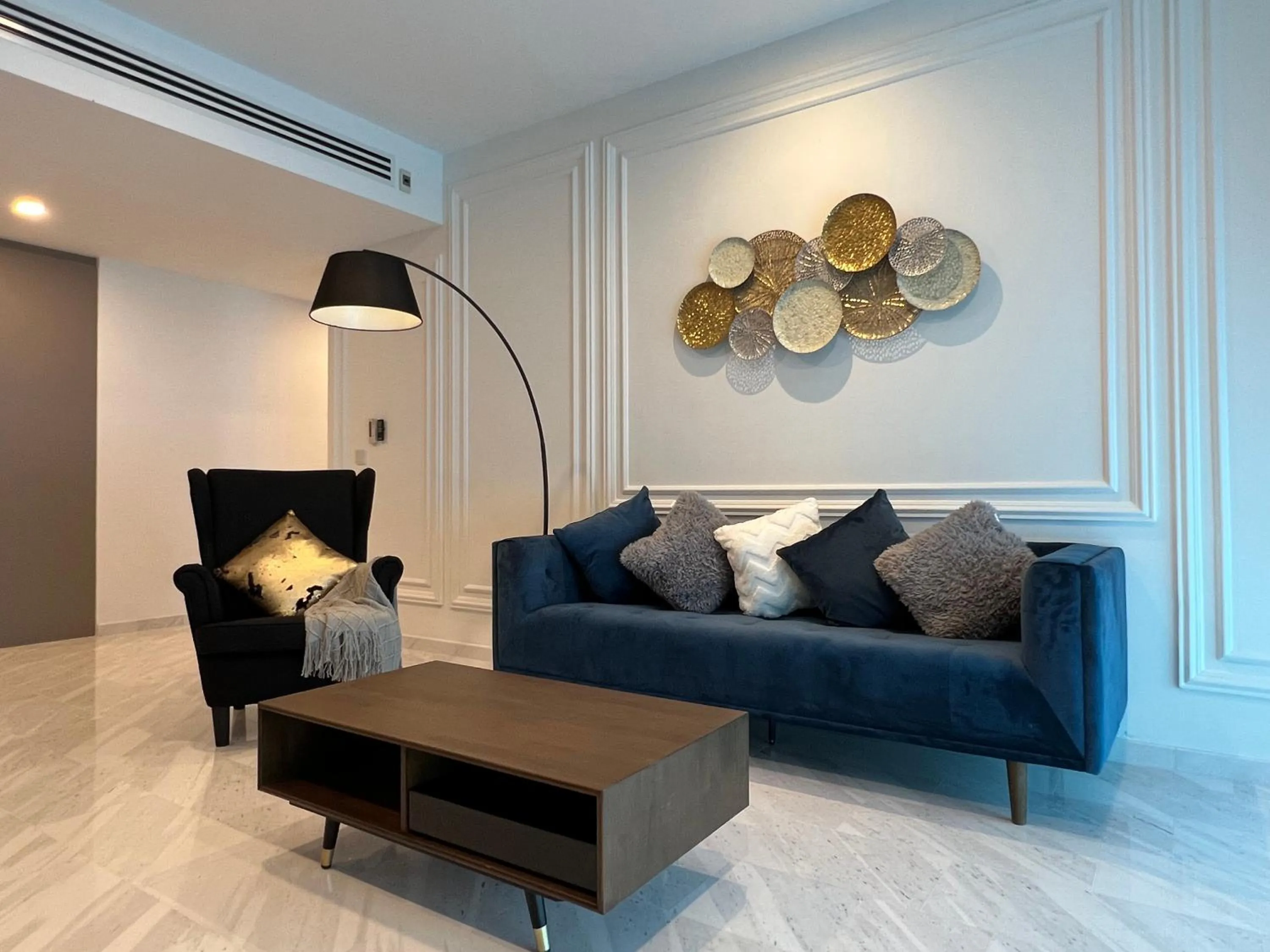 Living room in Eaton Residences KLCC by WSD