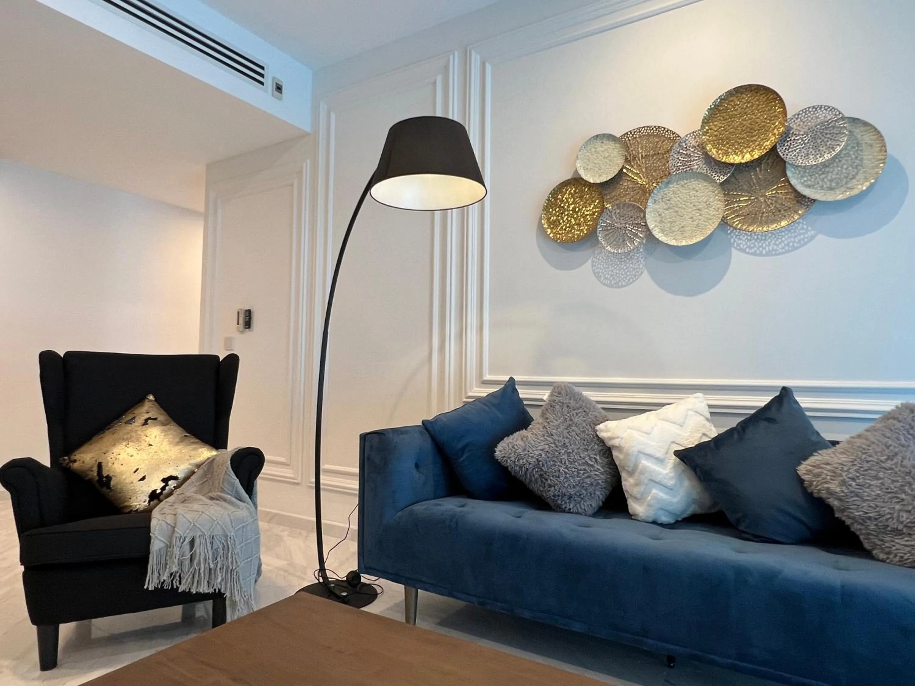 Living room in Eaton Residences KLCC by WSD