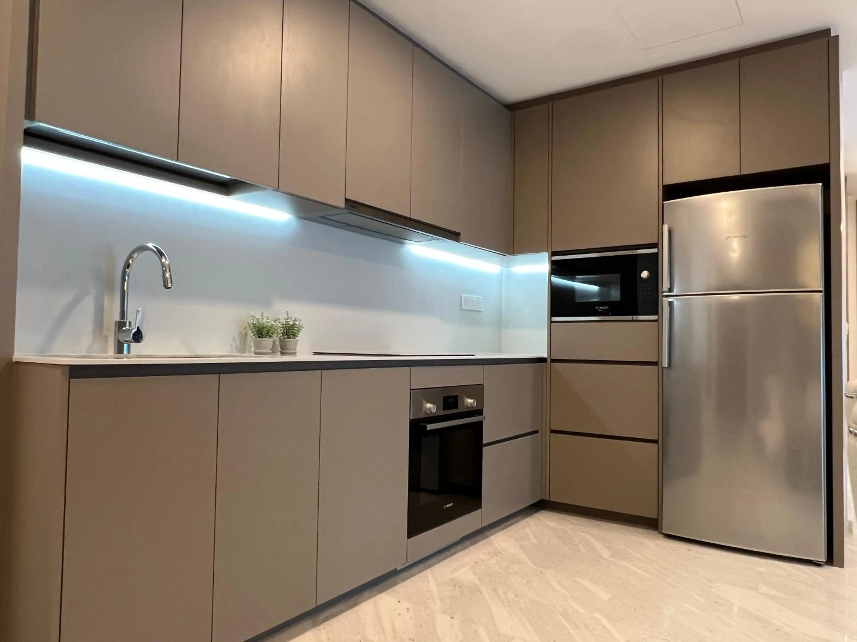 Kitchen or kitchenette in Eaton Residences KLCC by WSD