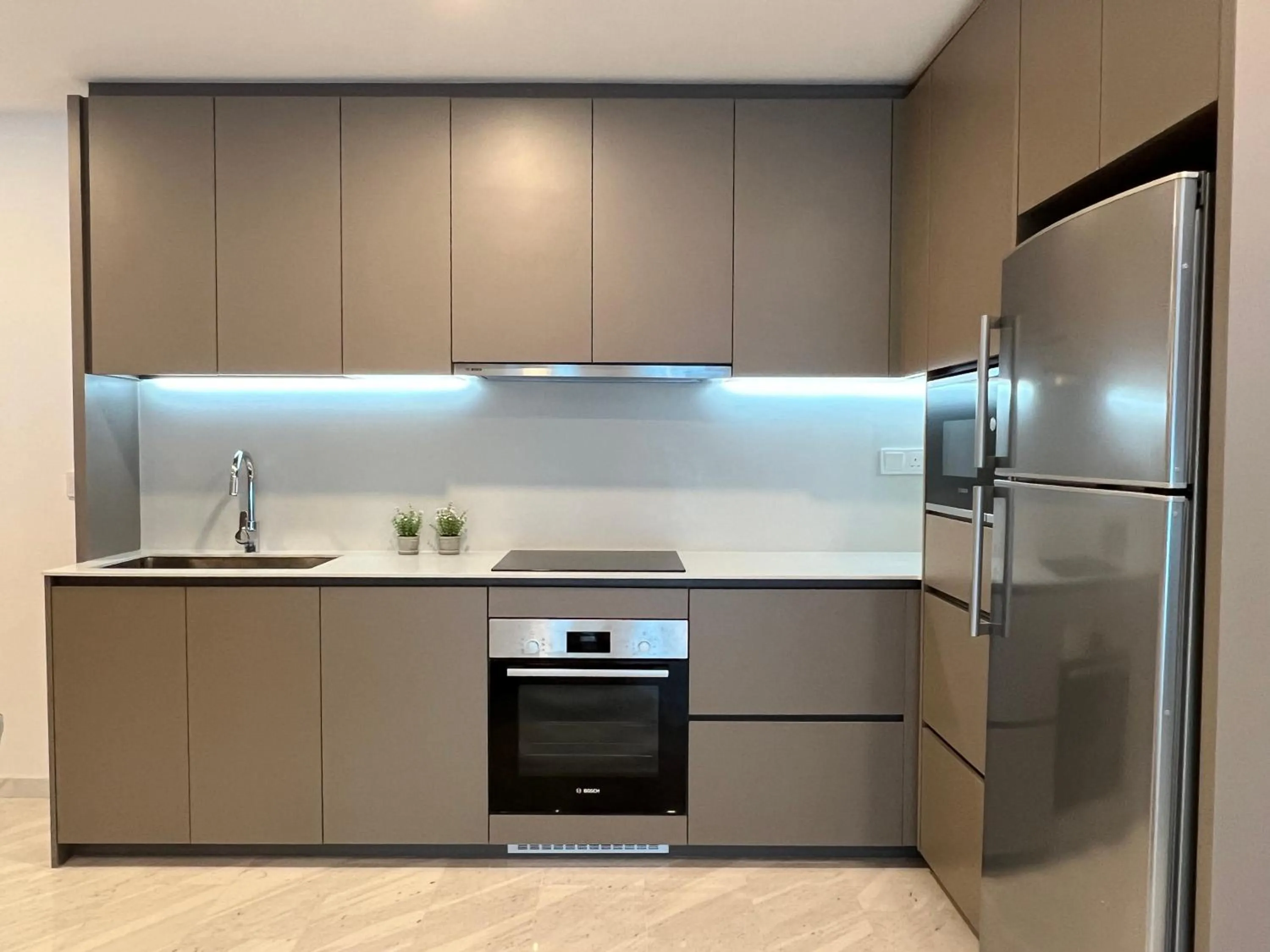 Kitchen or kitchenette in Eaton Residences KLCC by WSD