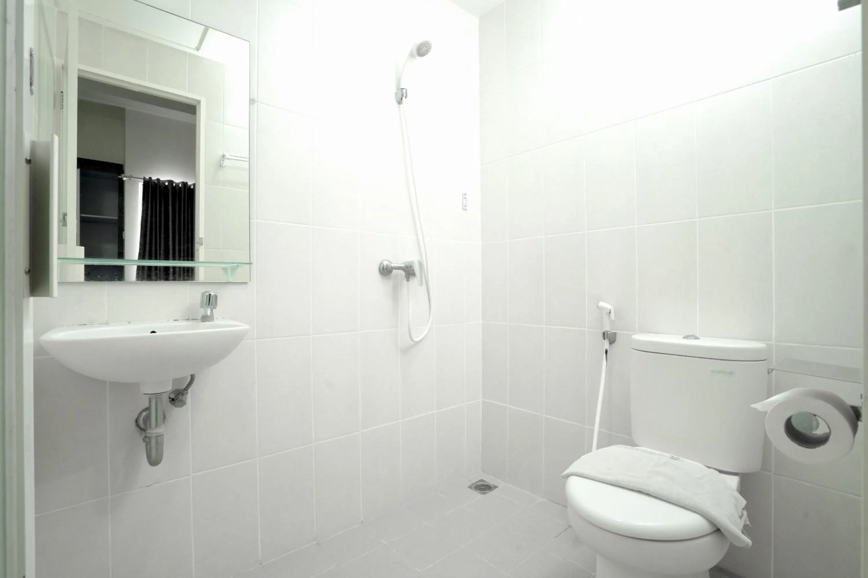 Shower in Menara One Hotel by Menara Santosa