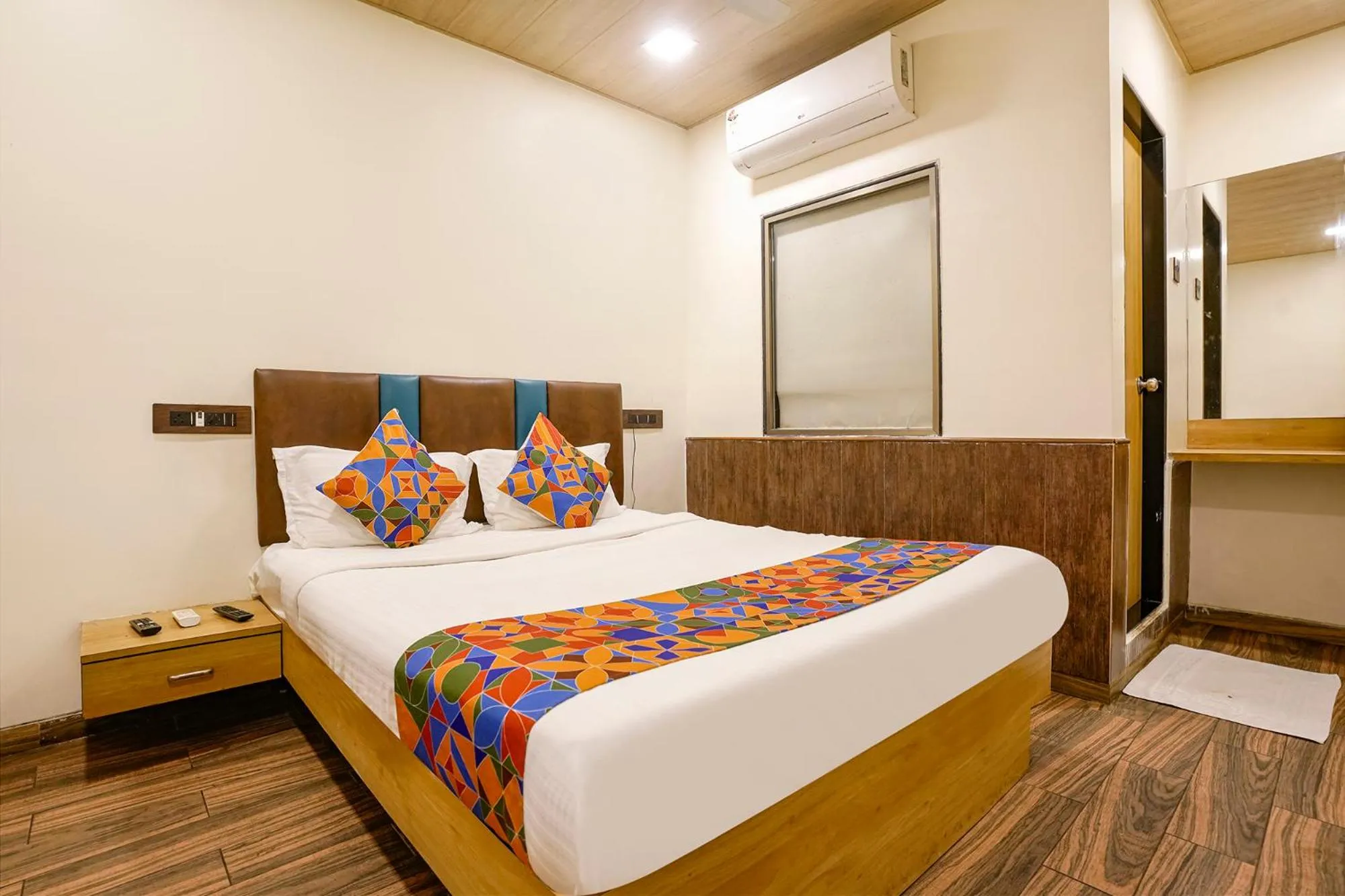 Bed in FabHotel Malali Residency