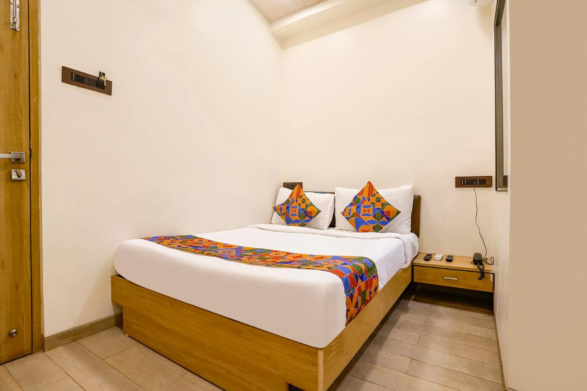 Bed in FabHotel Malali Residency