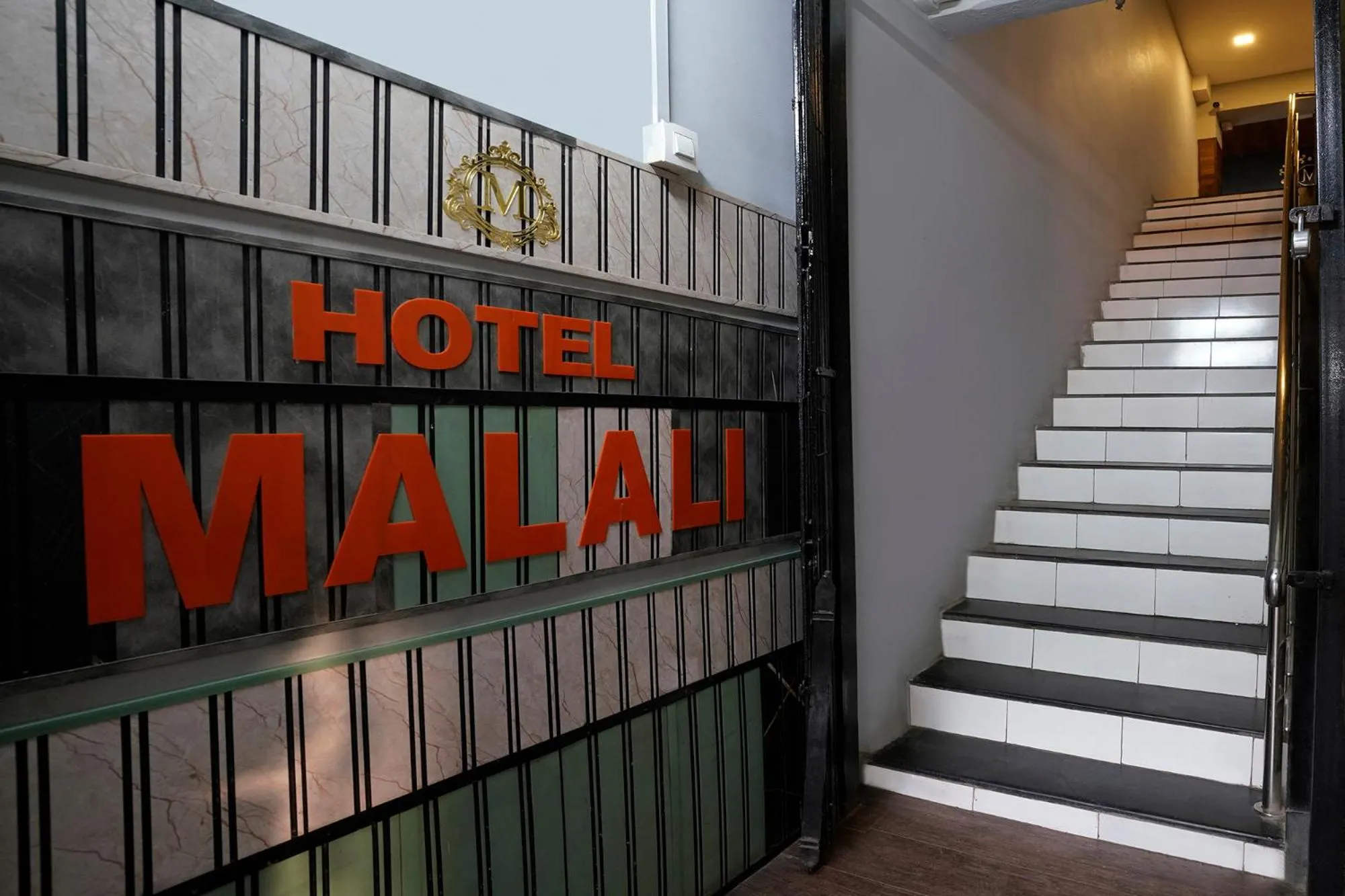 Facade/entrance in FabHotel Malali Residency