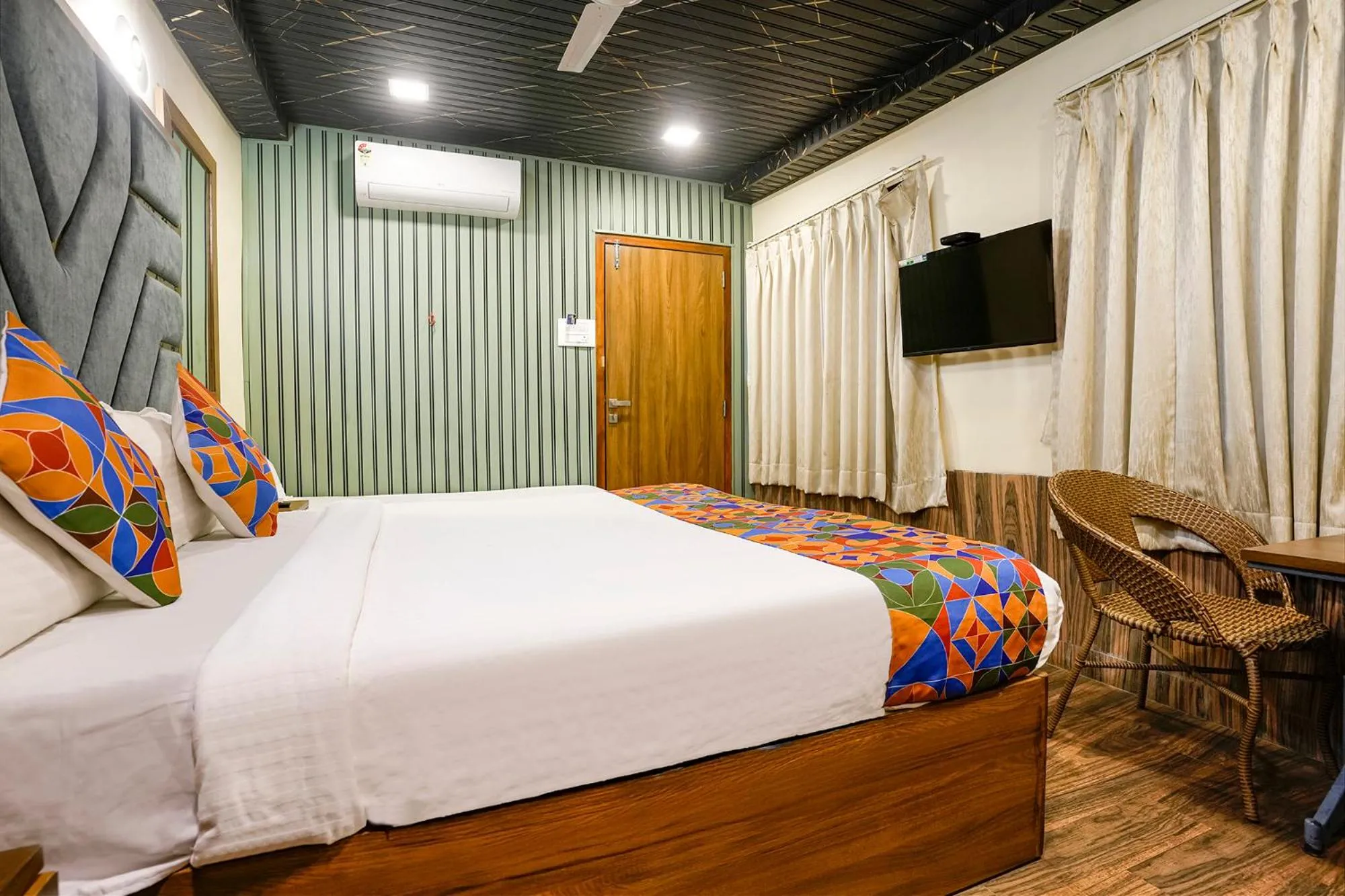 Bed in FabHotel Malali Residency