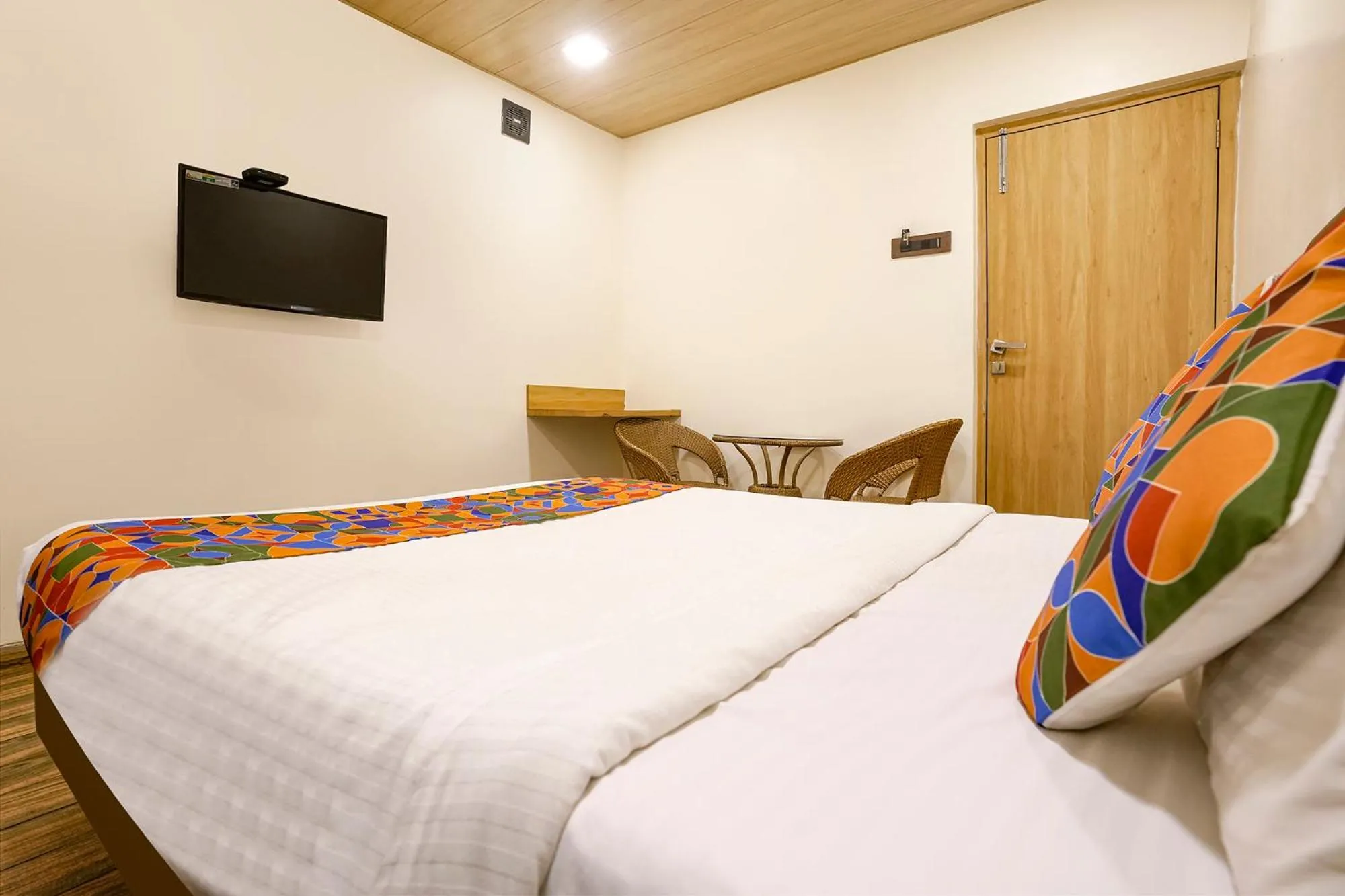 Bed in FabHotel Malali Residency