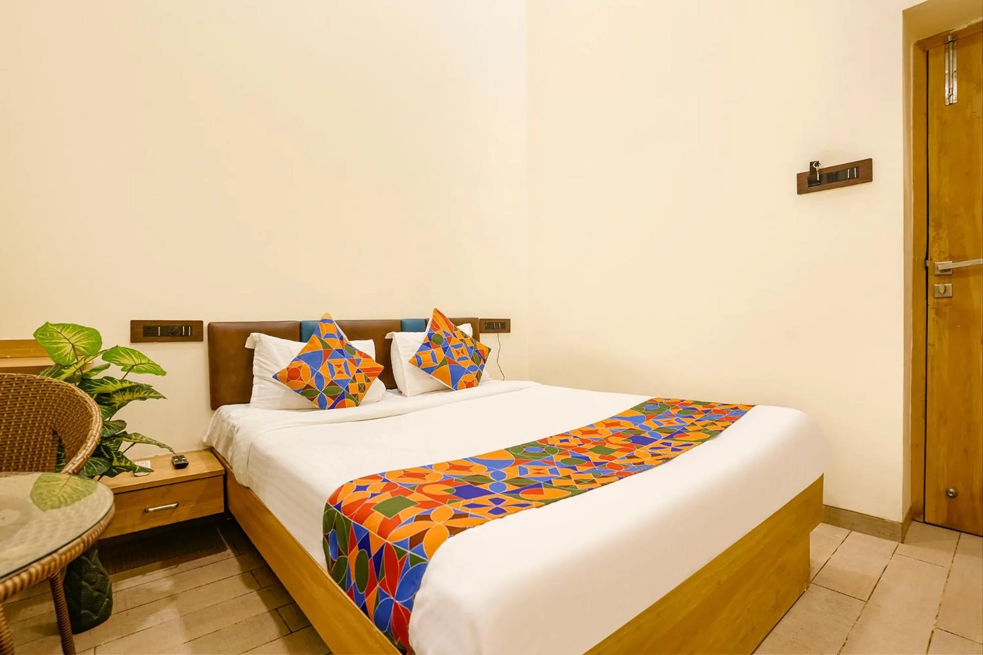 Bed in FabHotel Malali Residency