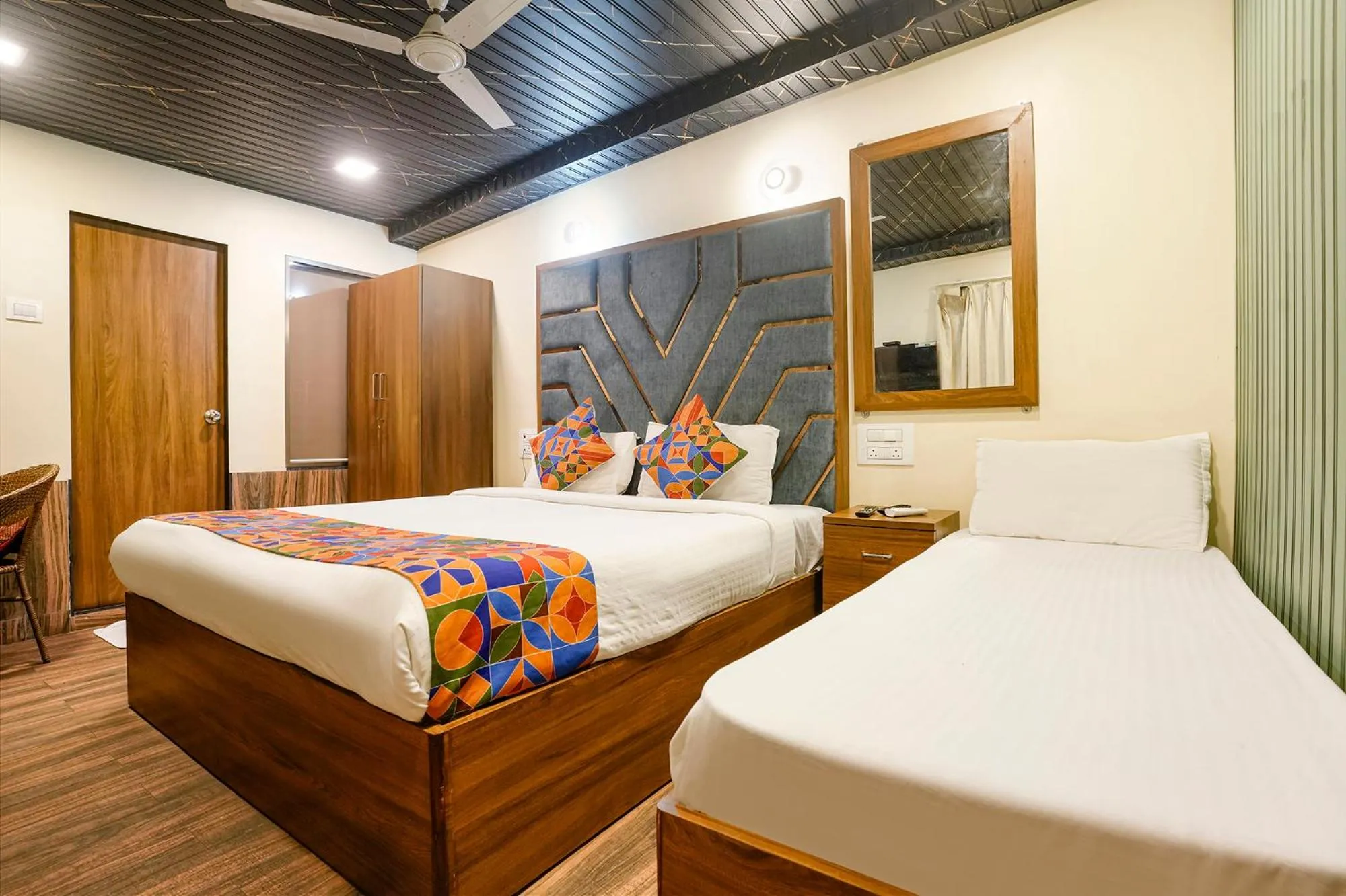 Bed in FabHotel Malali Residency
