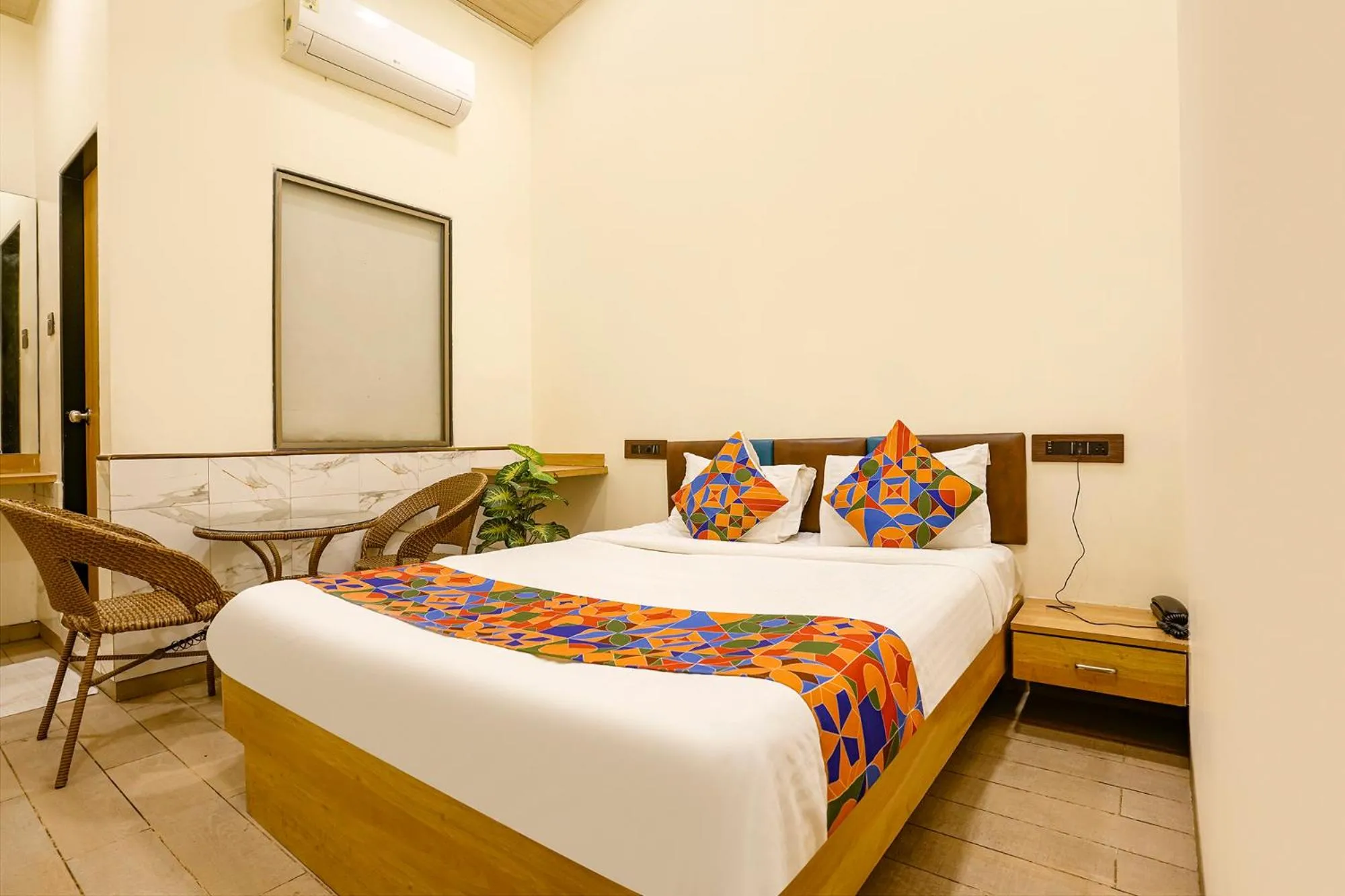 Bed in FabHotel Malali Residency