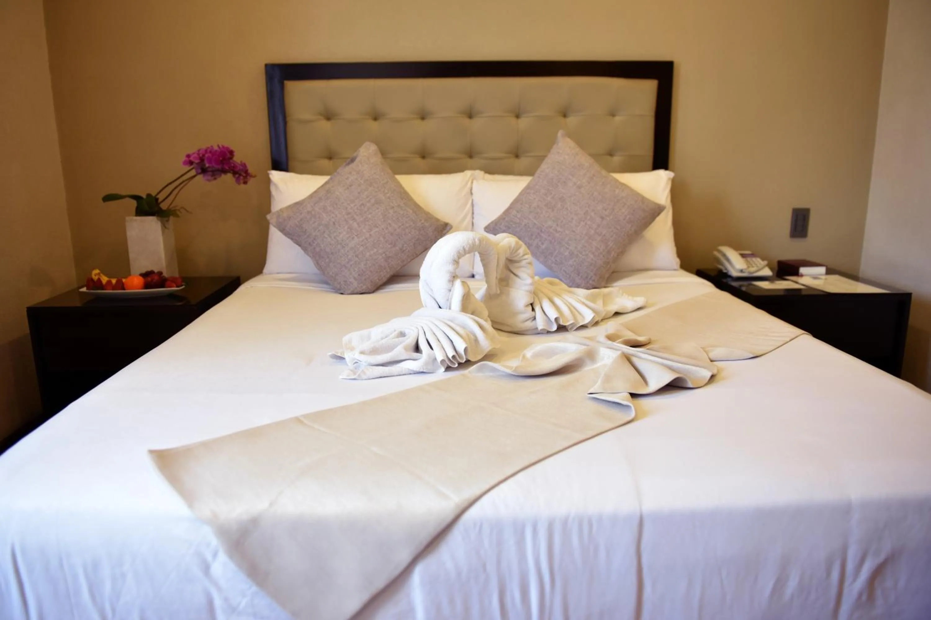 Bedroom in Aura One Hotel