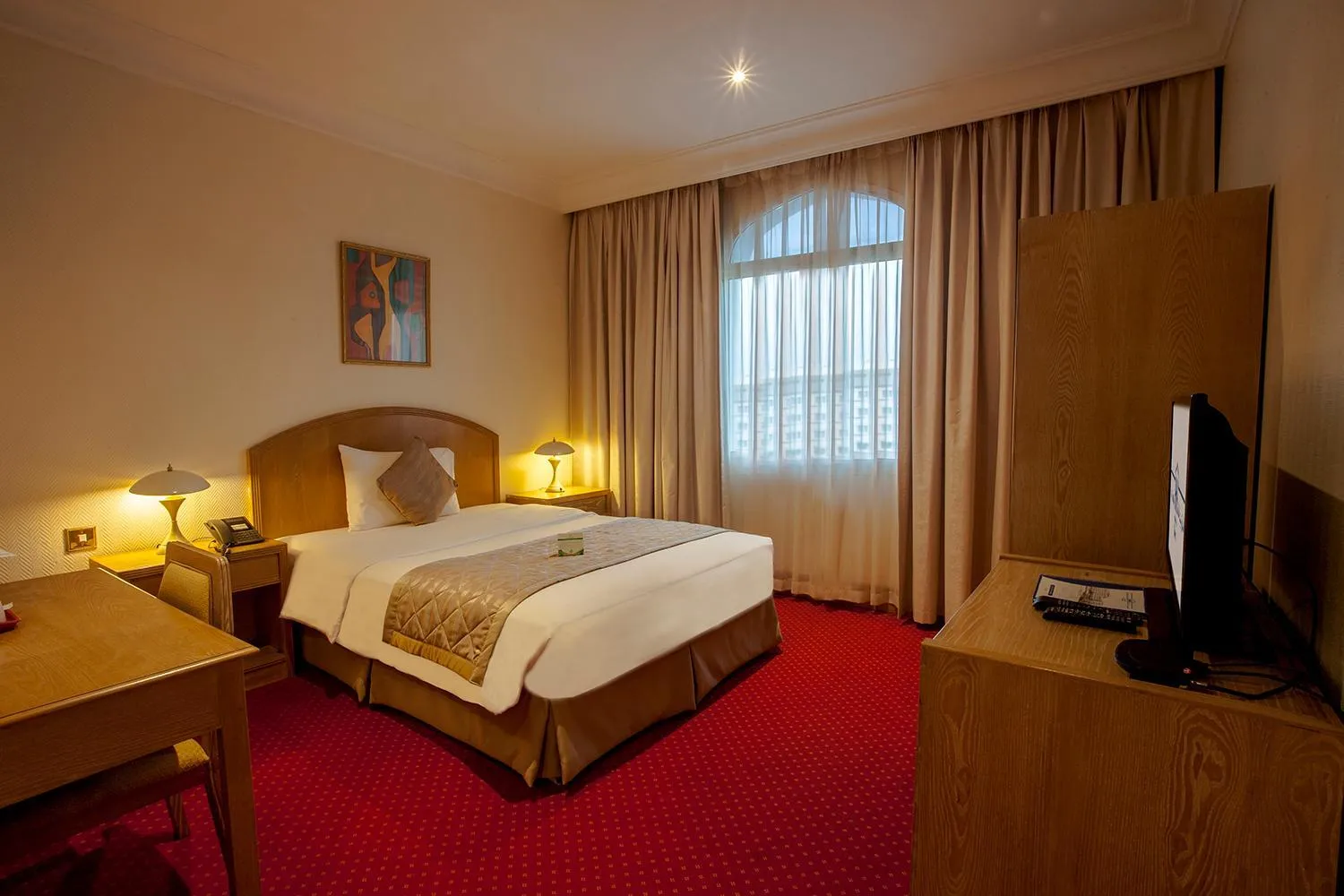 Bed in HAFFA HOUSE HOTEL