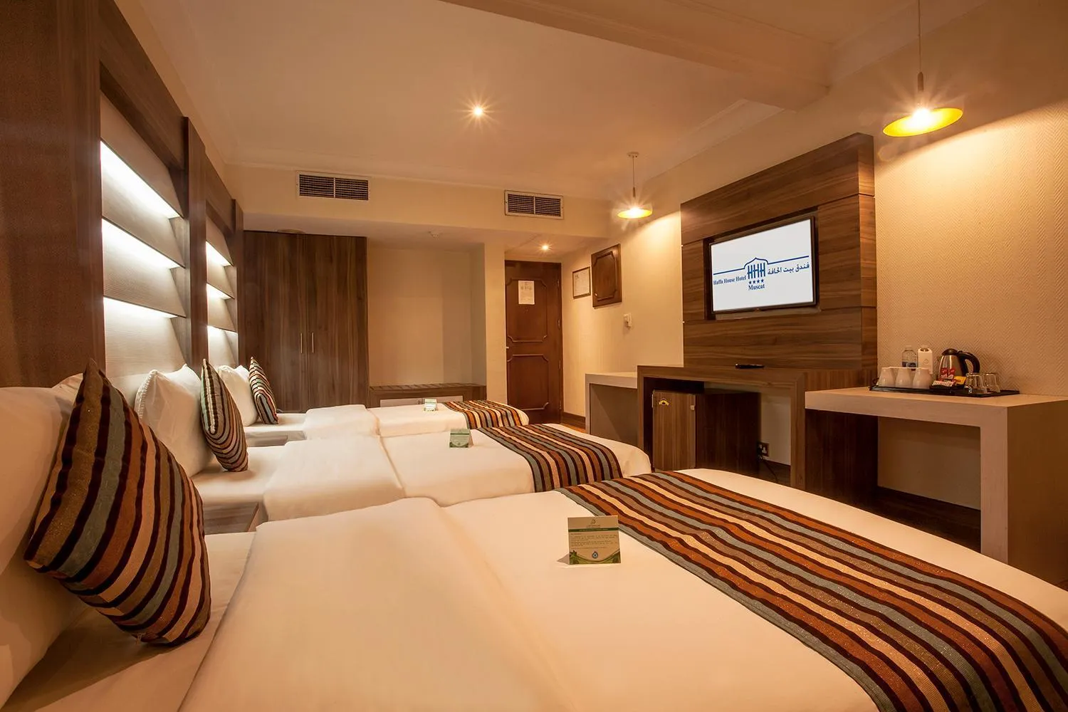 Bed in HAFFA HOUSE HOTEL