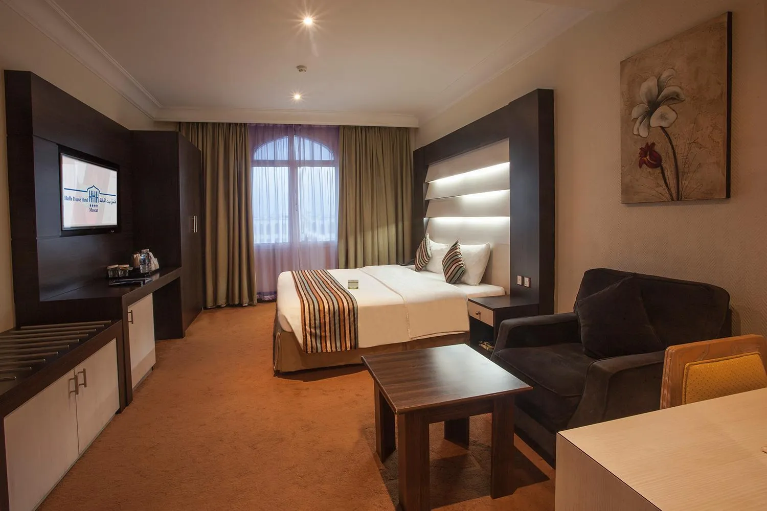 Seating area, Bed in HAFFA HOUSE HOTEL