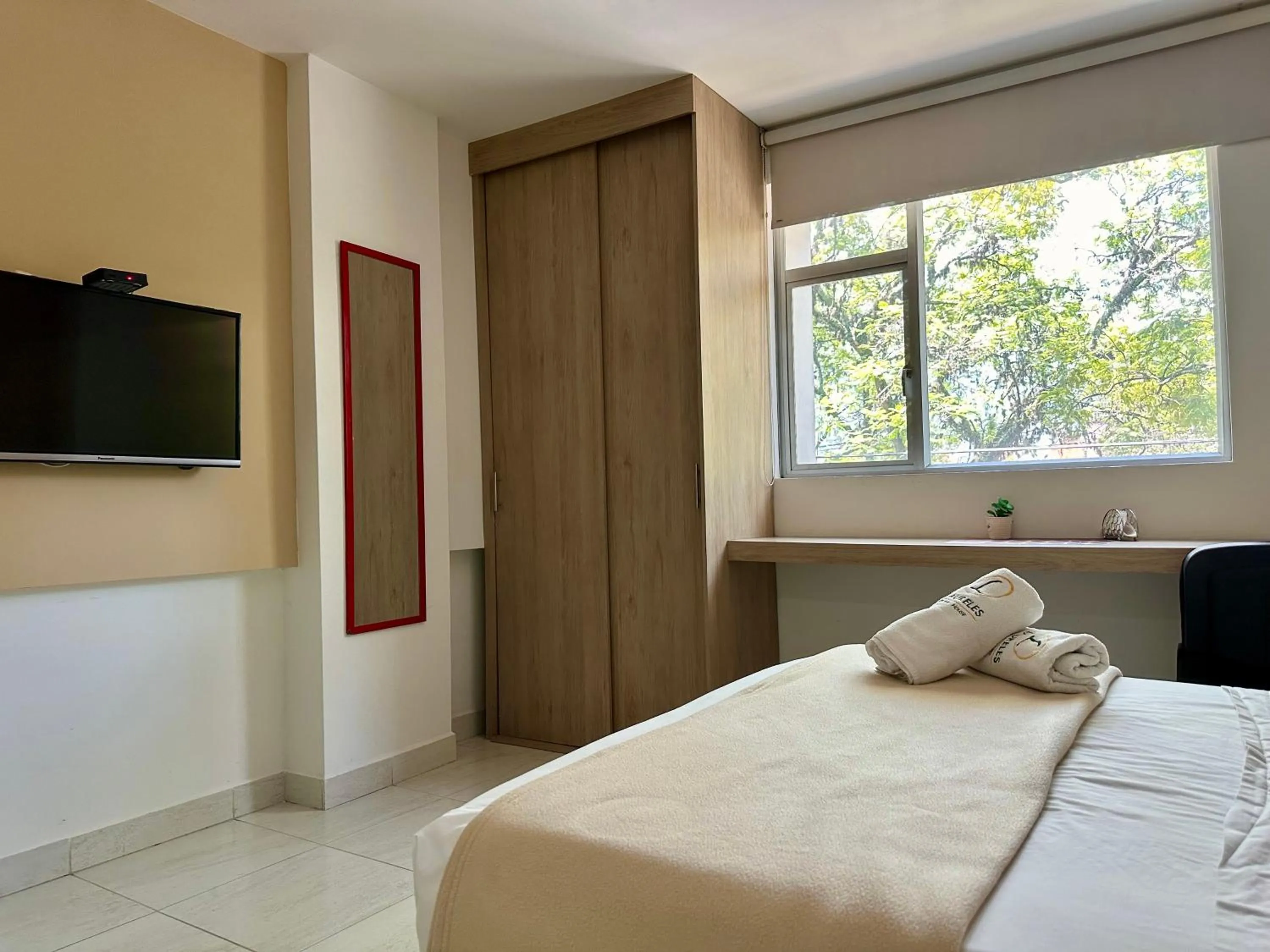 TV and multimedia, Bed in Laureles Guest House LGH Hotel
