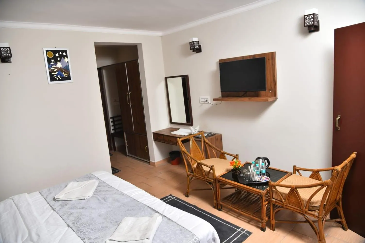 Photo of the whole room, Bed in Kumaon Roop Resort Near Neem Karoli Temple