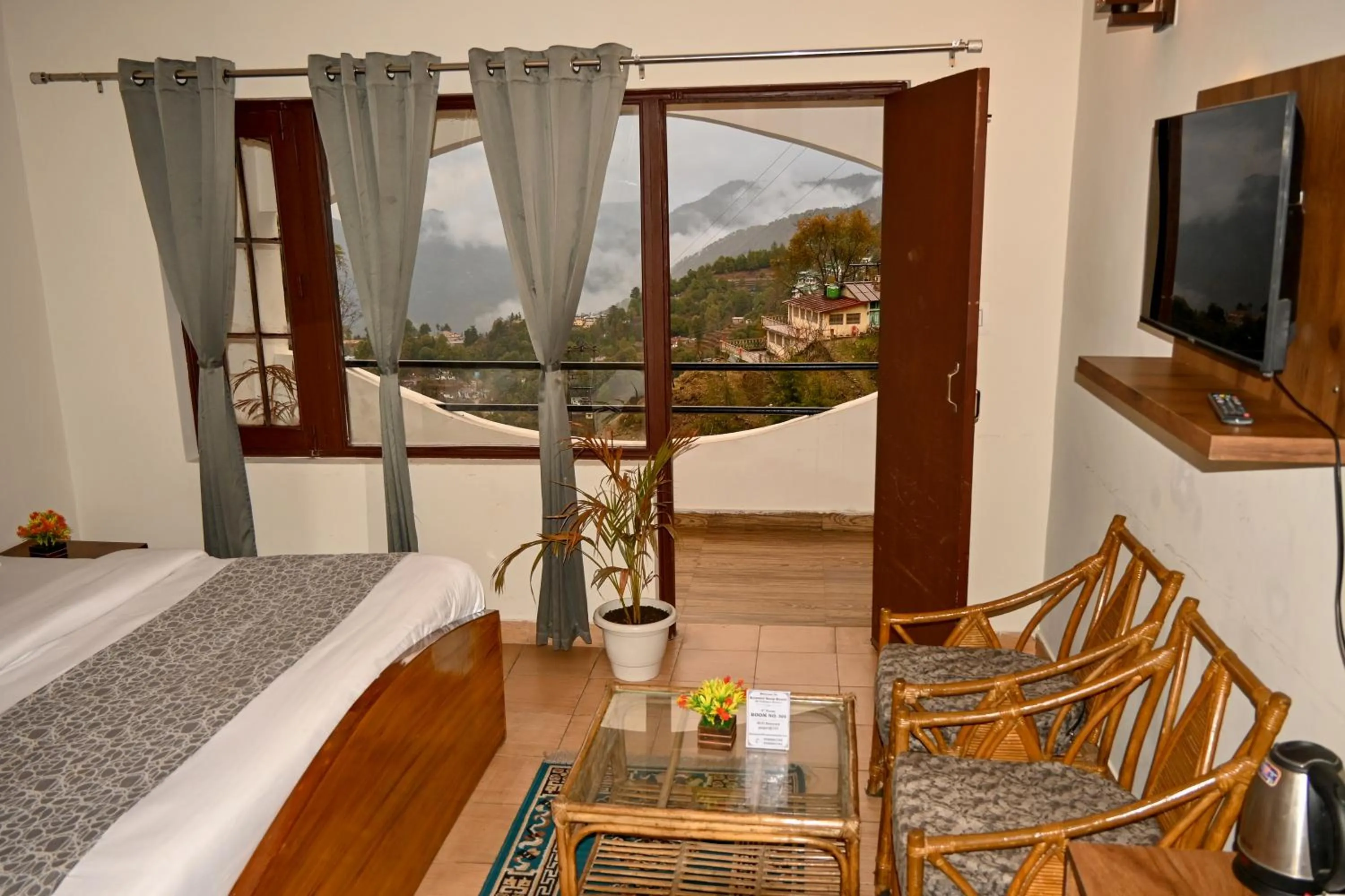 TV and multimedia in Kumaon Roop Resort Near Neem Karoli Temple