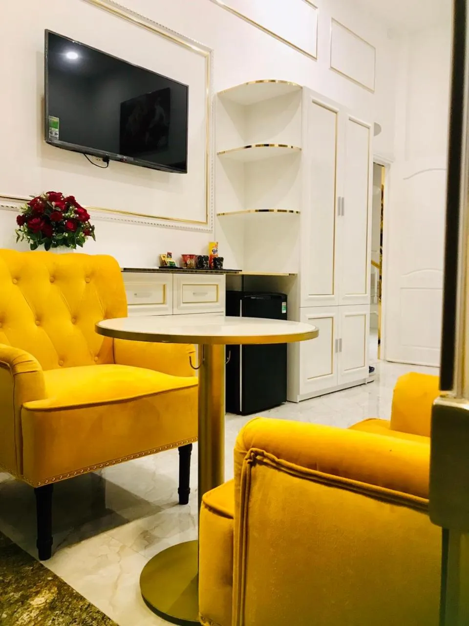 Living room in Paradise Hotel & Homestay access alley 100m