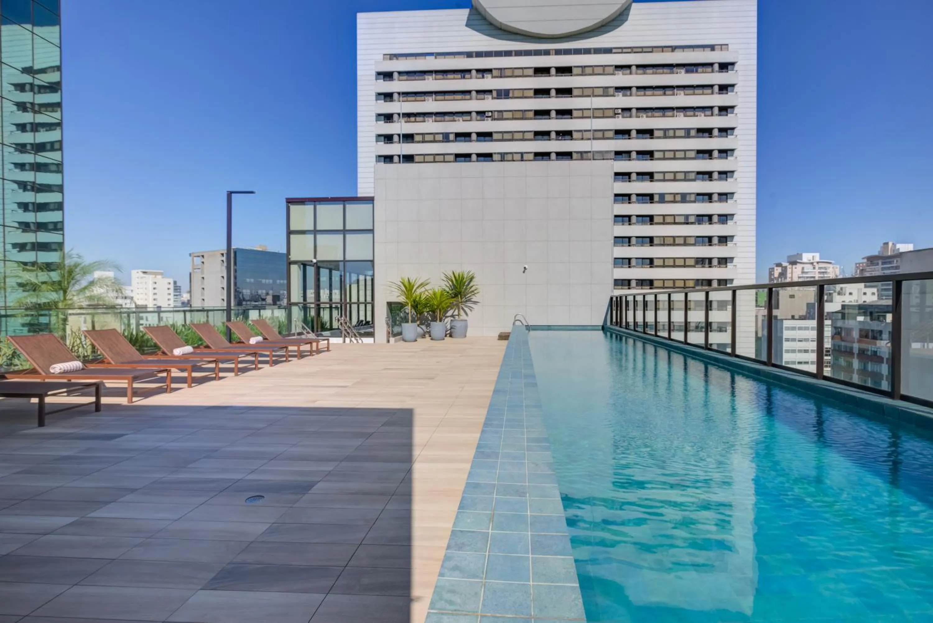 Pool view in Qoya São Paulo Paulista, Curio Collection by Hilton