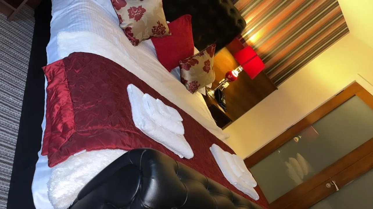 Bed in The Hedges Hotel