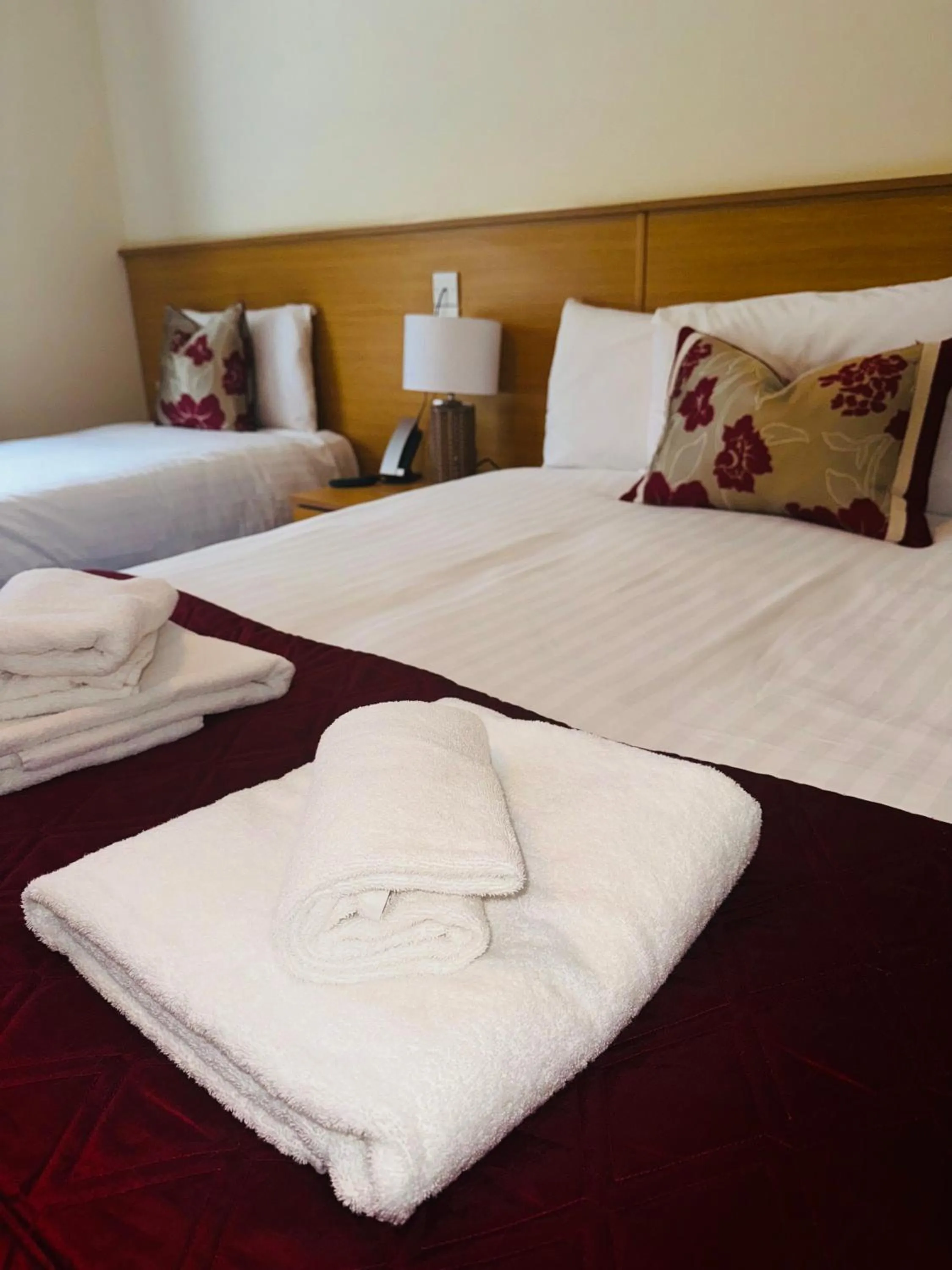 Bed in The Hedges Hotel