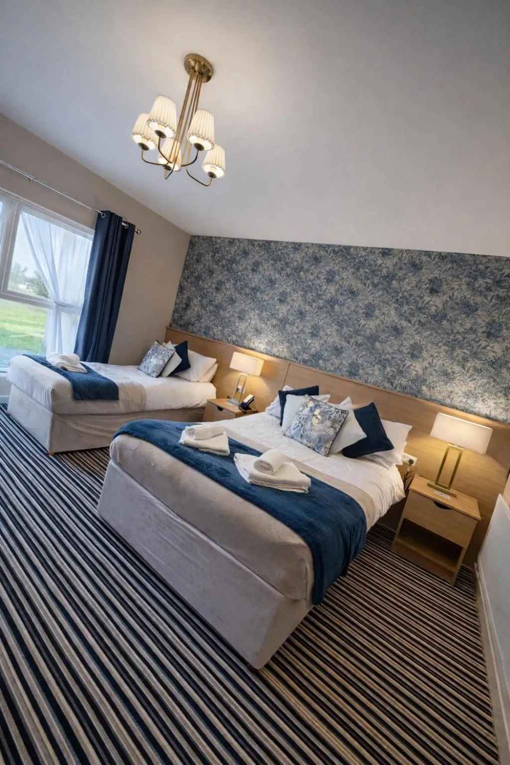 Bed in The Hedges Hotel