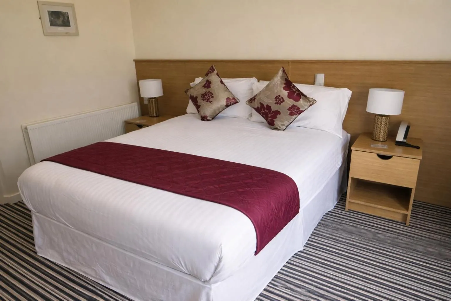 Bed in The Hedges Hotel