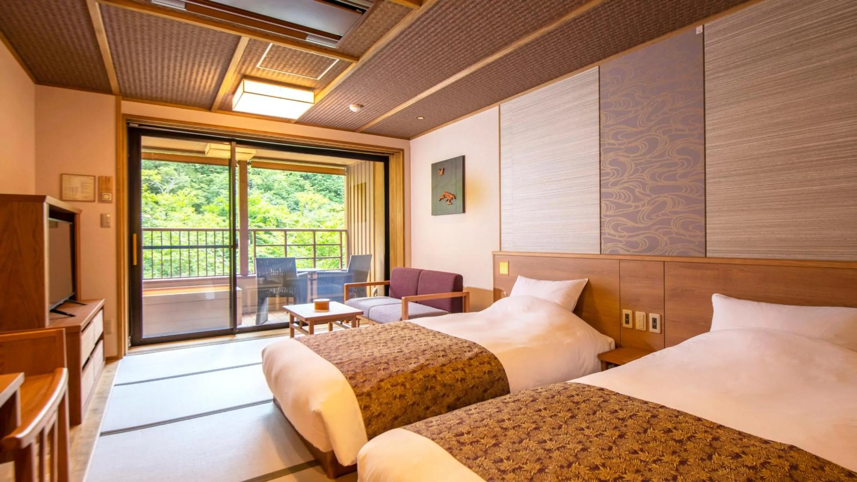 Bed in Shionoyu Onsen Rengetsu