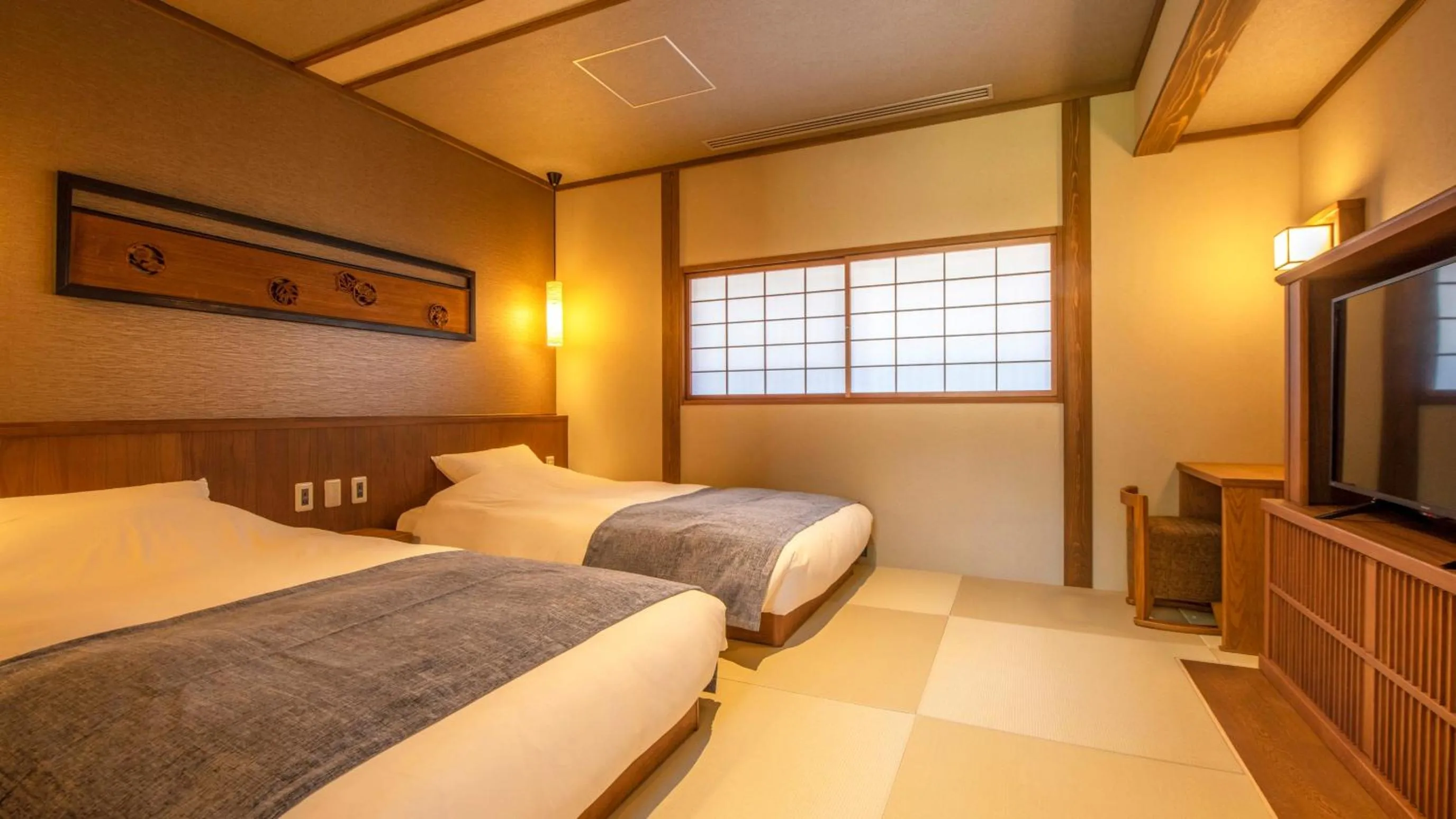 Photo of the whole room, Bed in Shionoyu Onsen Rengetsu