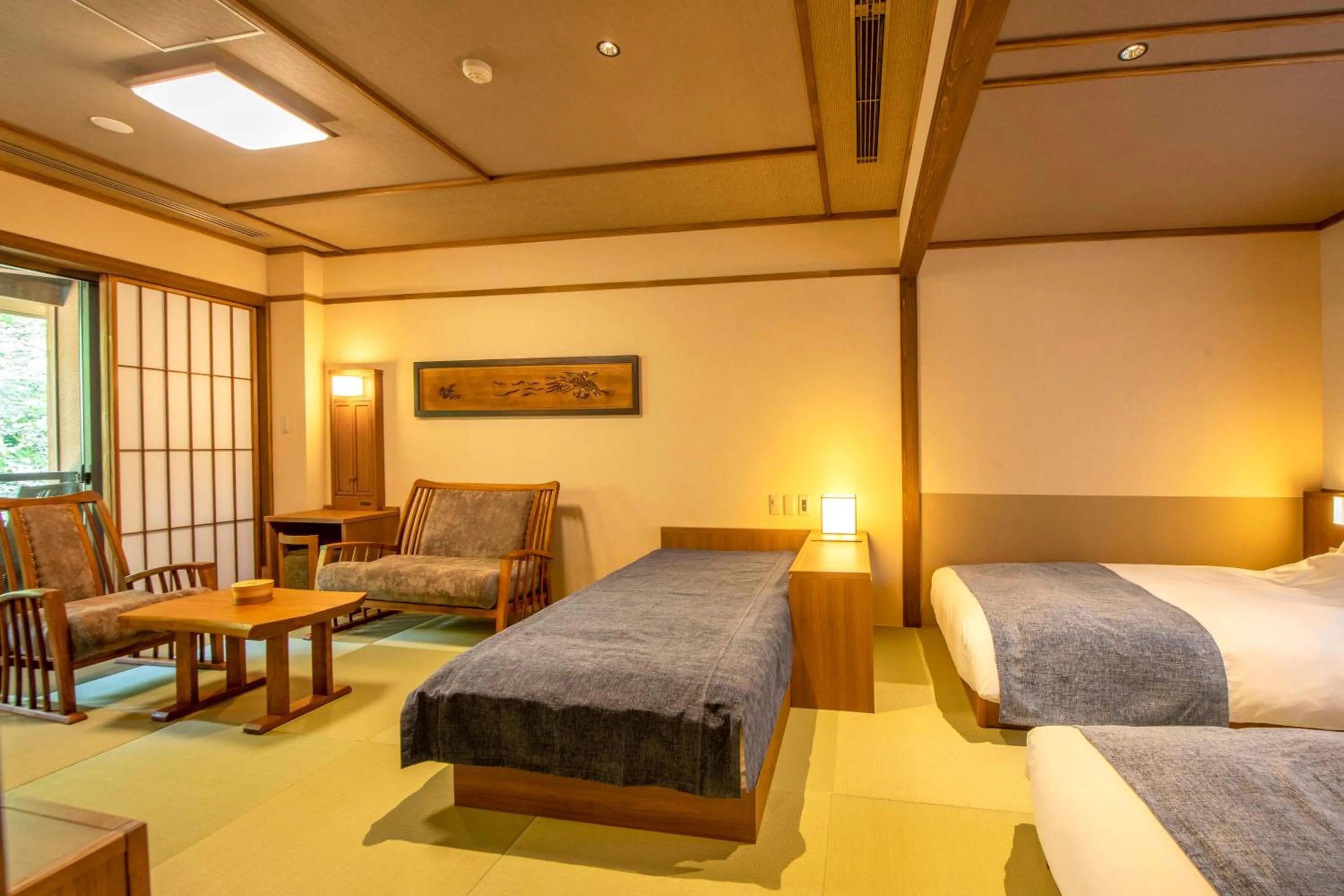 Living room, Bed in Shionoyu Onsen Rengetsu