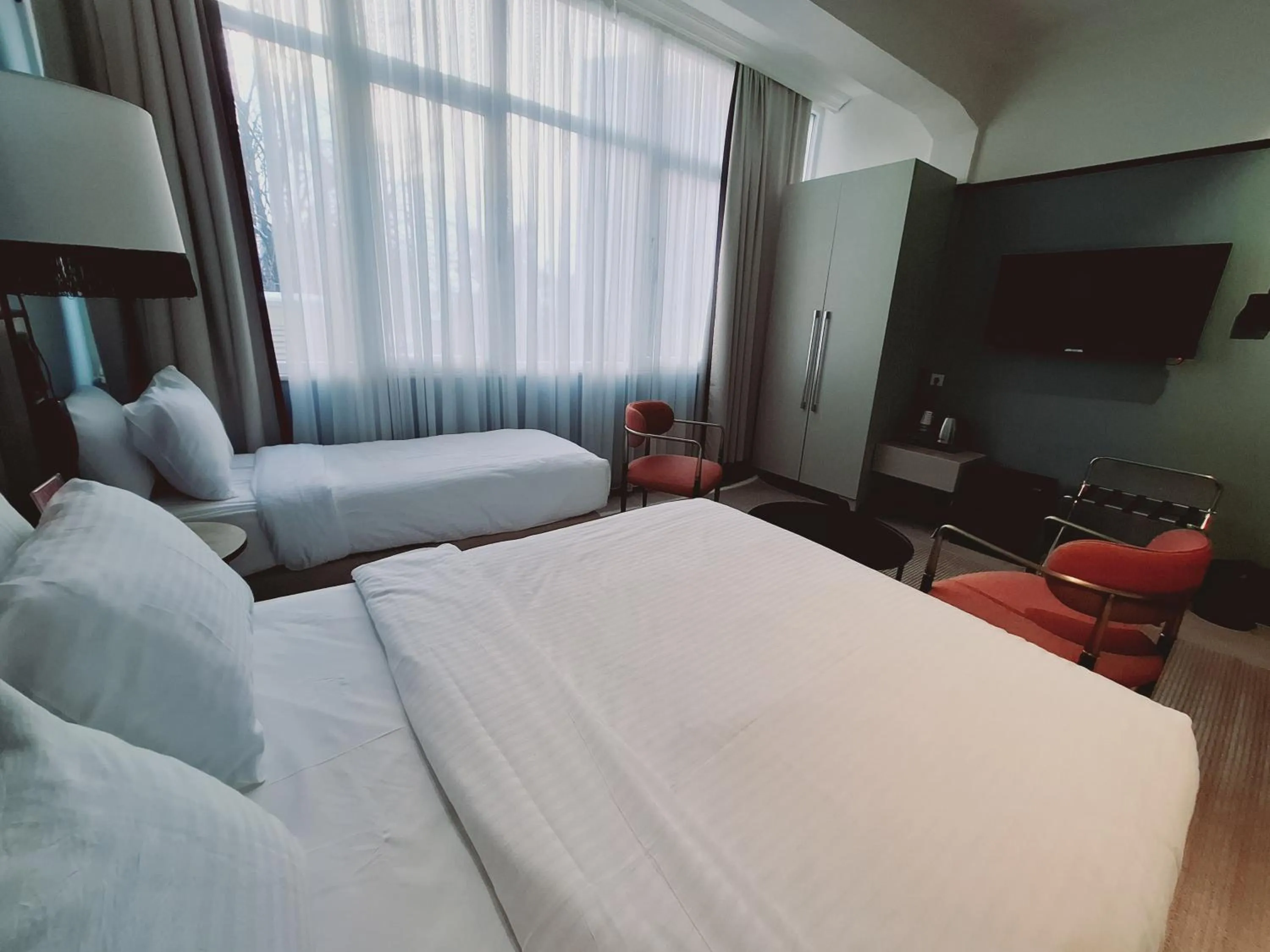 Bed in EA Exclusive Hotel