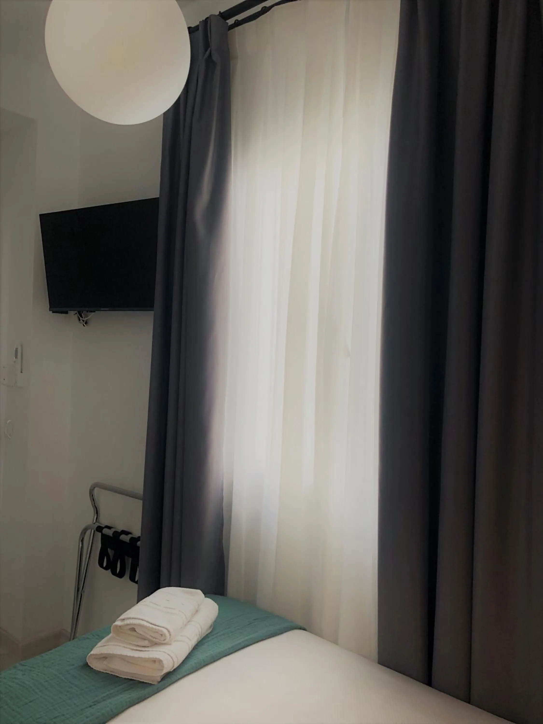 Bed in Hostal Hom Museo