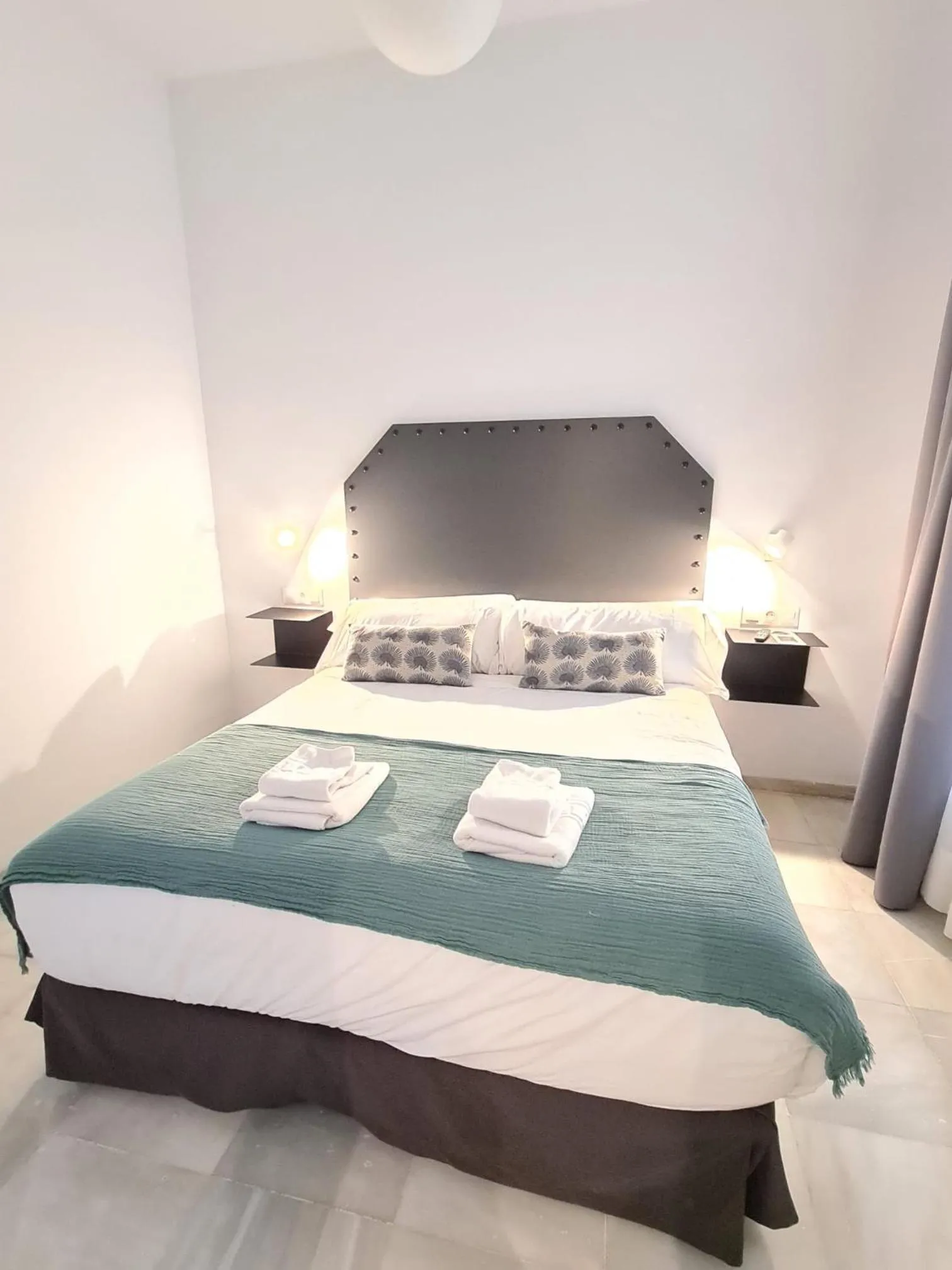 Bed in Hostal Hom Museo