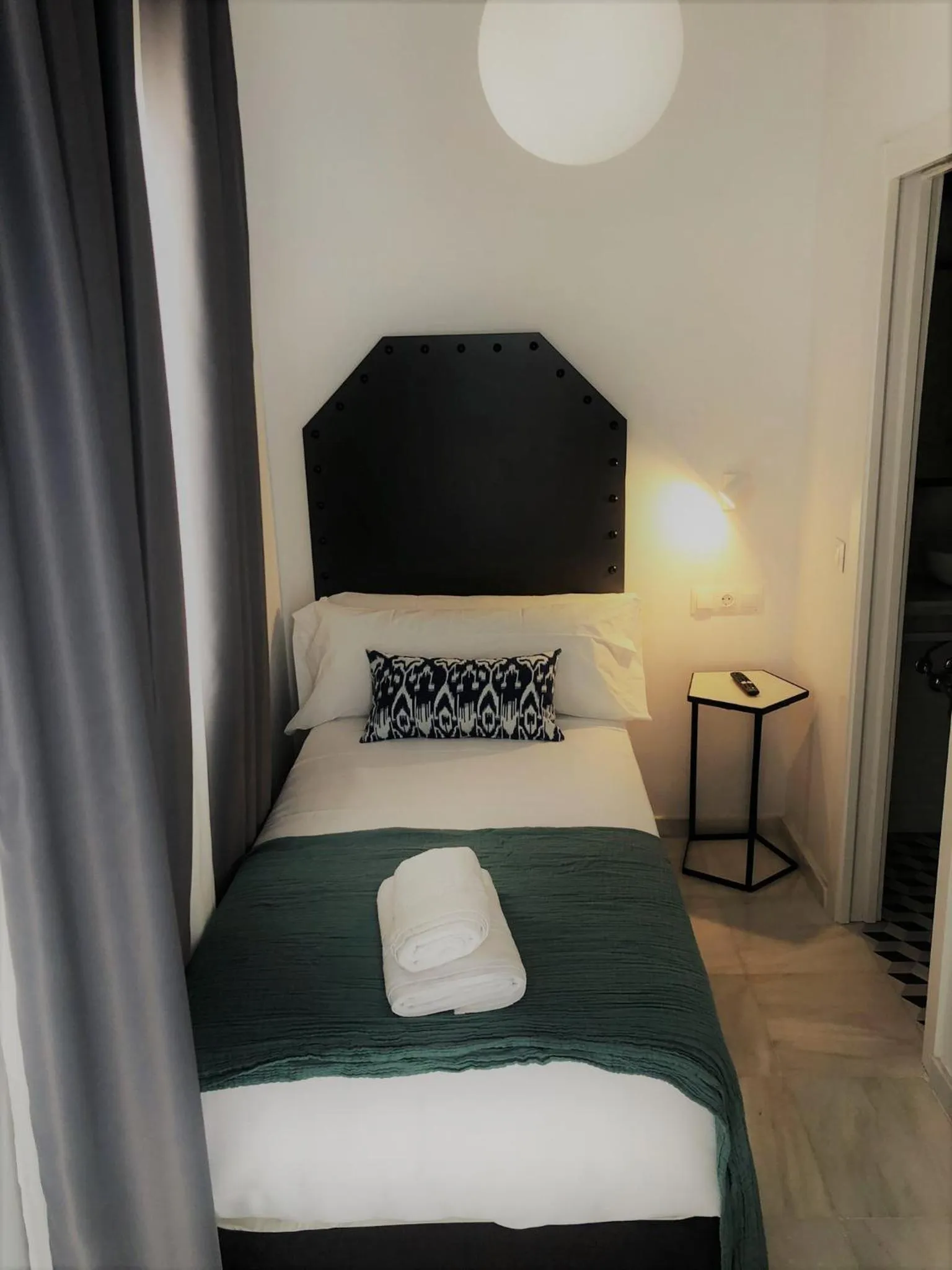 Bed in Hostal Hom Museo