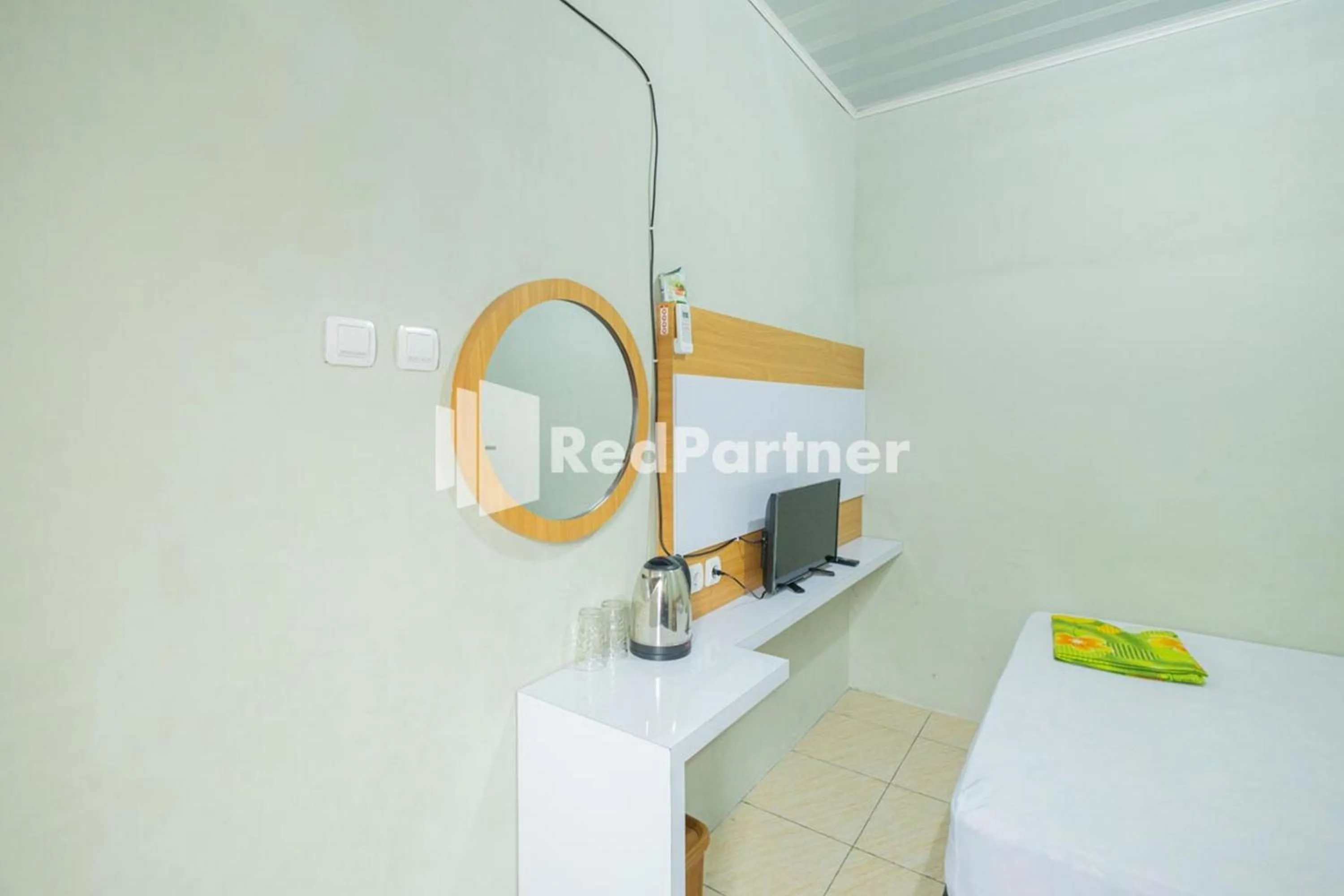 Bedroom in Atiq Homestay Syariah Mitra RedDoorz